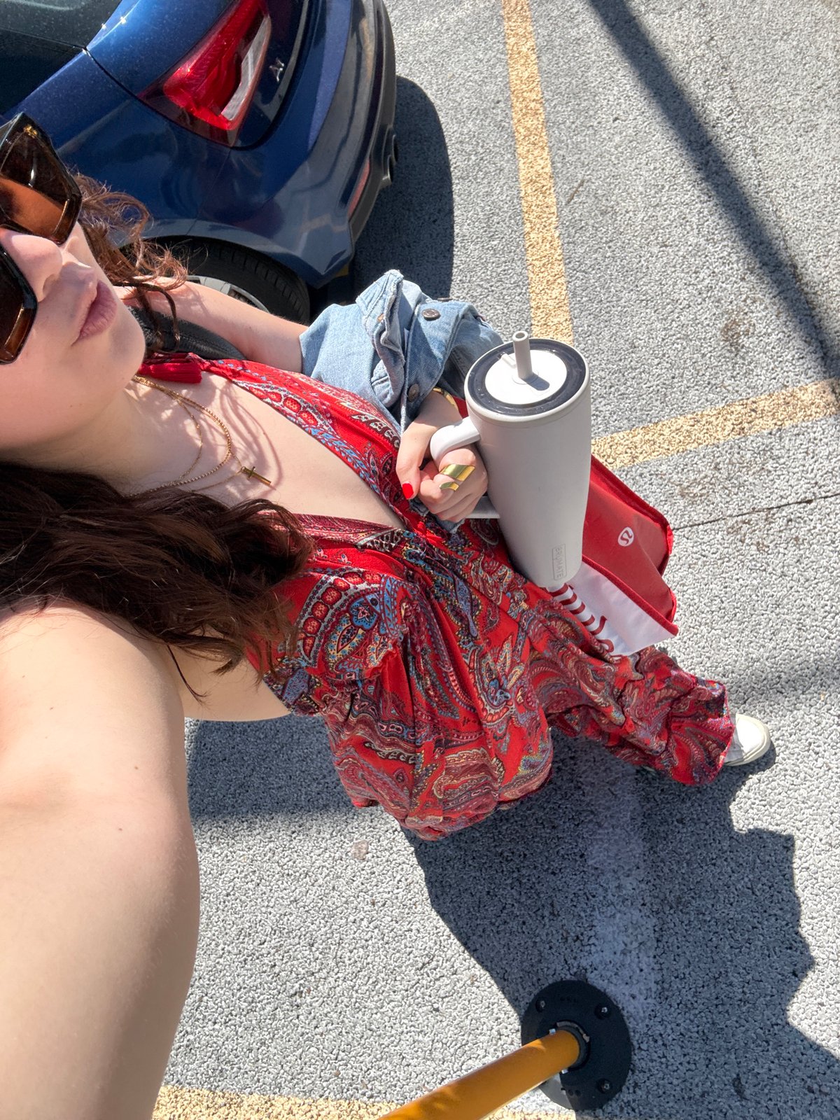 Woman takes selfie in Mexico City parking lot