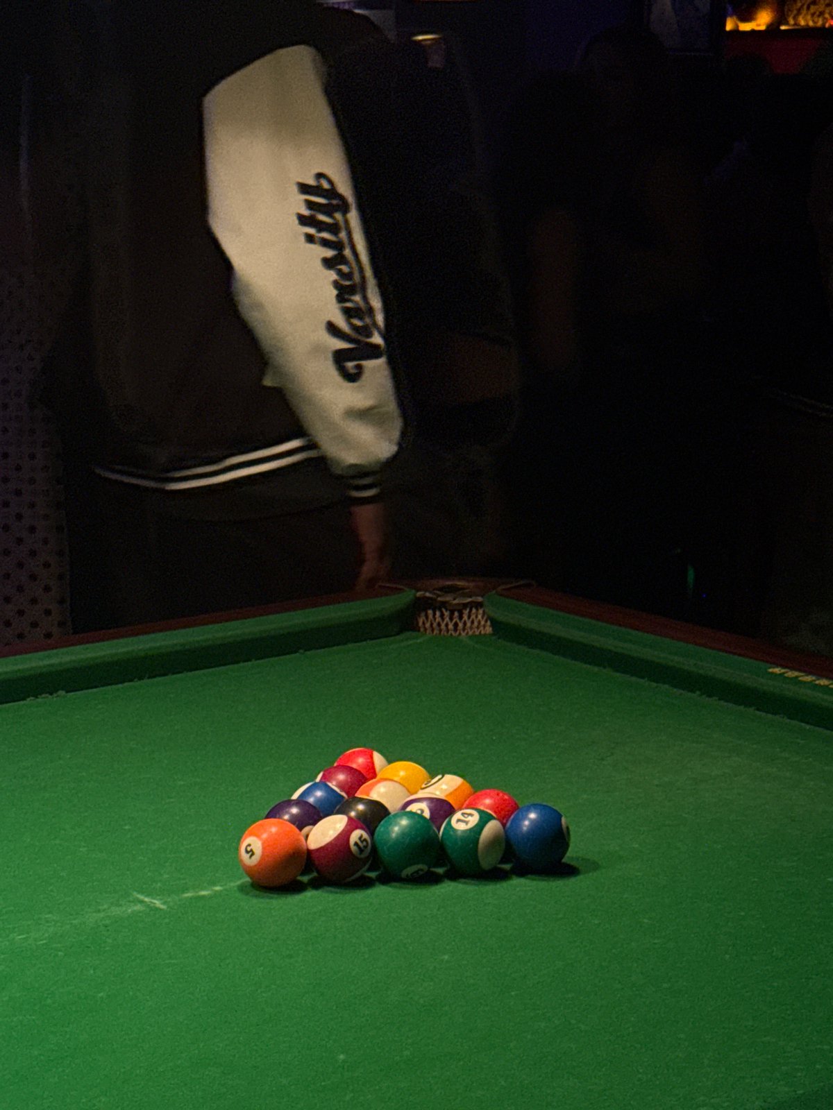Evening social gathering at pool hall in Liangjiang