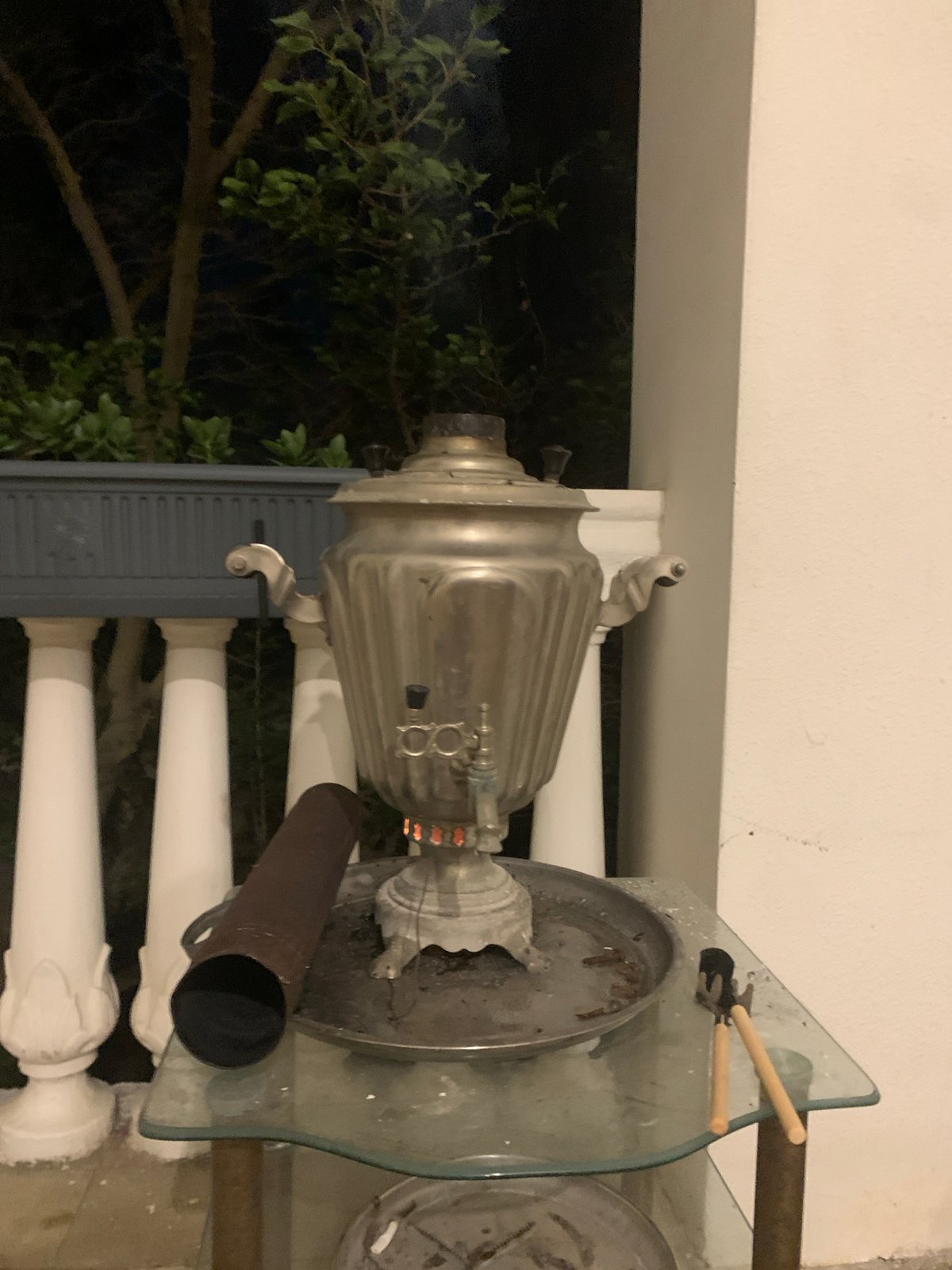 Samovar burning on a balcony in Khazar Raion at night