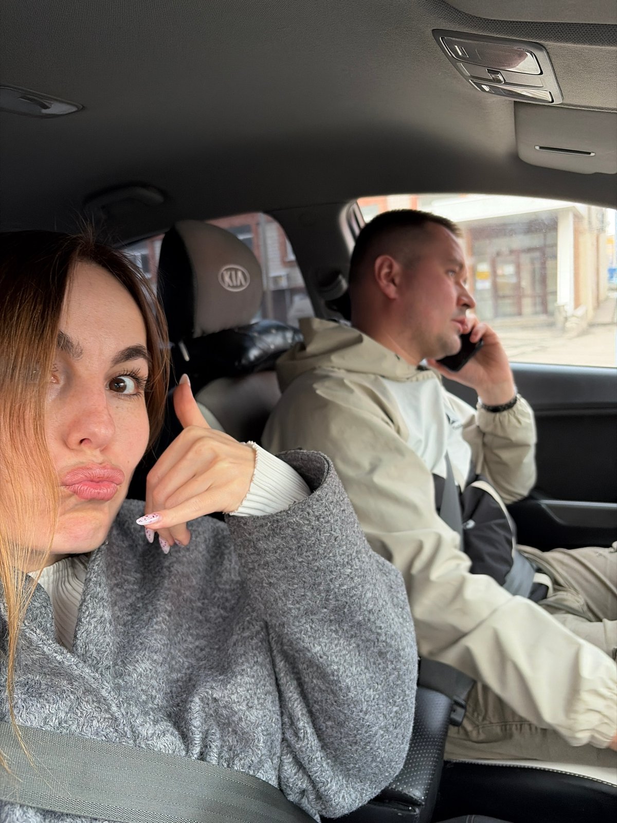 Woman photographed with grinding wheel equipment in Izhevsk car