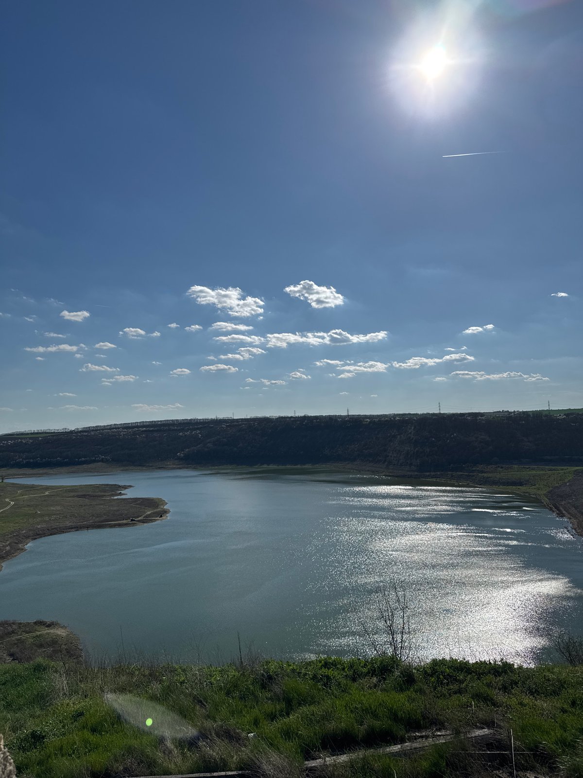 Sunlit lake scene documented in Odrintsi, Bulgaria