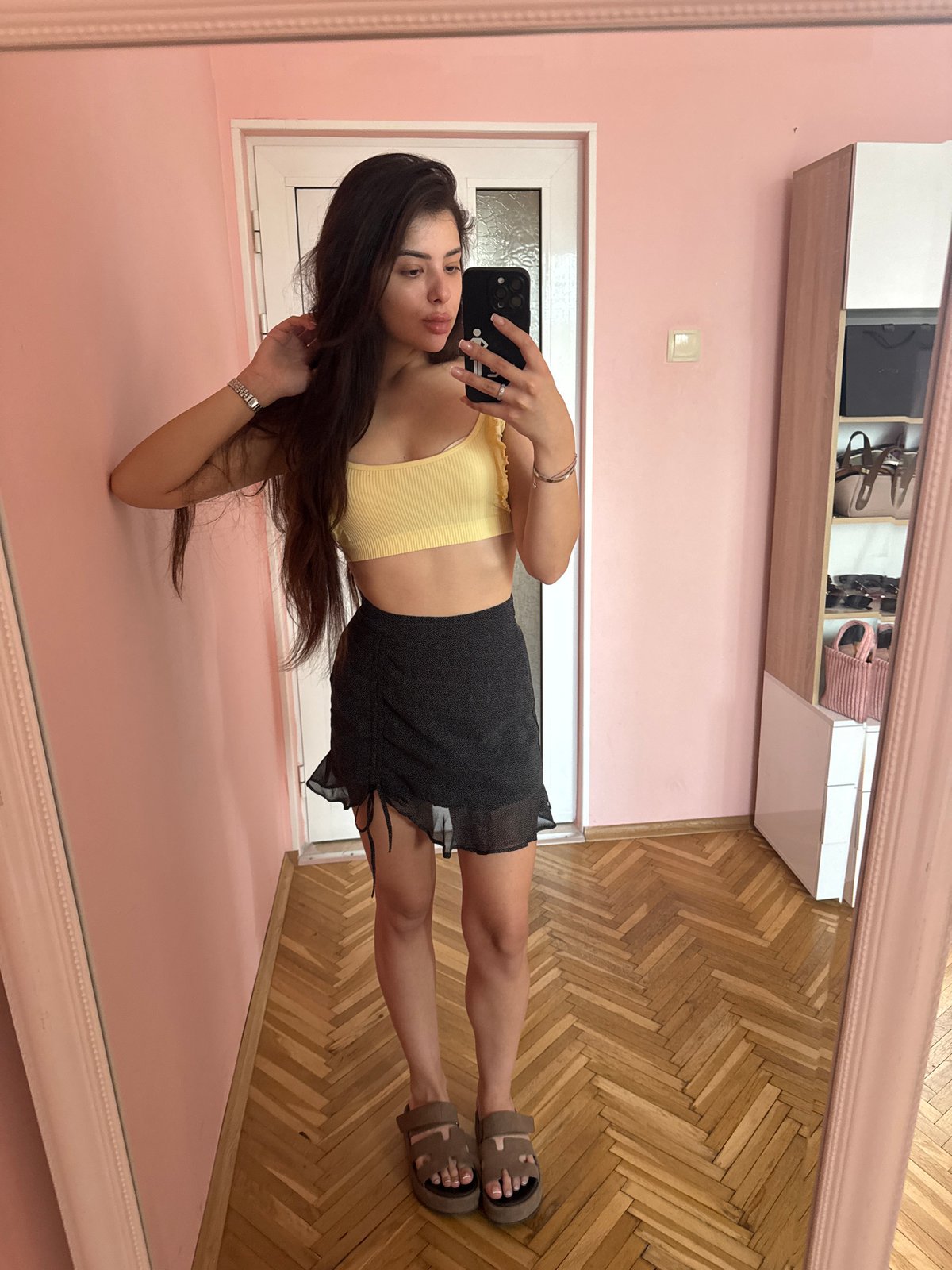 Woman takes multiple selfies across Plovdiv during morning outing