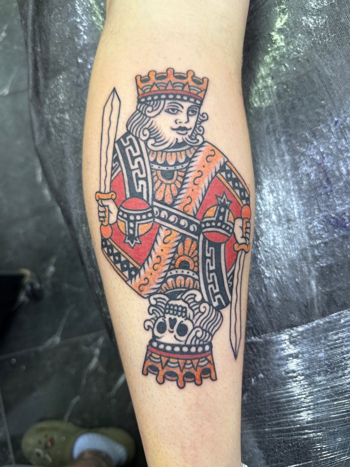 Fresh playing card tattoo completed on leg in Moscow