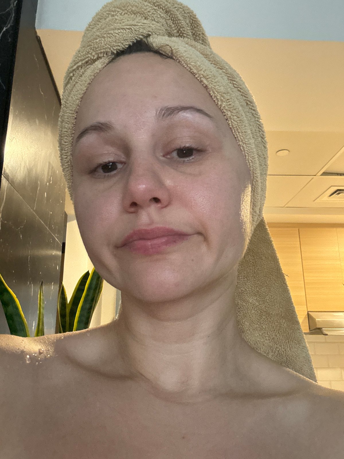 Woman photographed multiple times in Dubai interior spaces