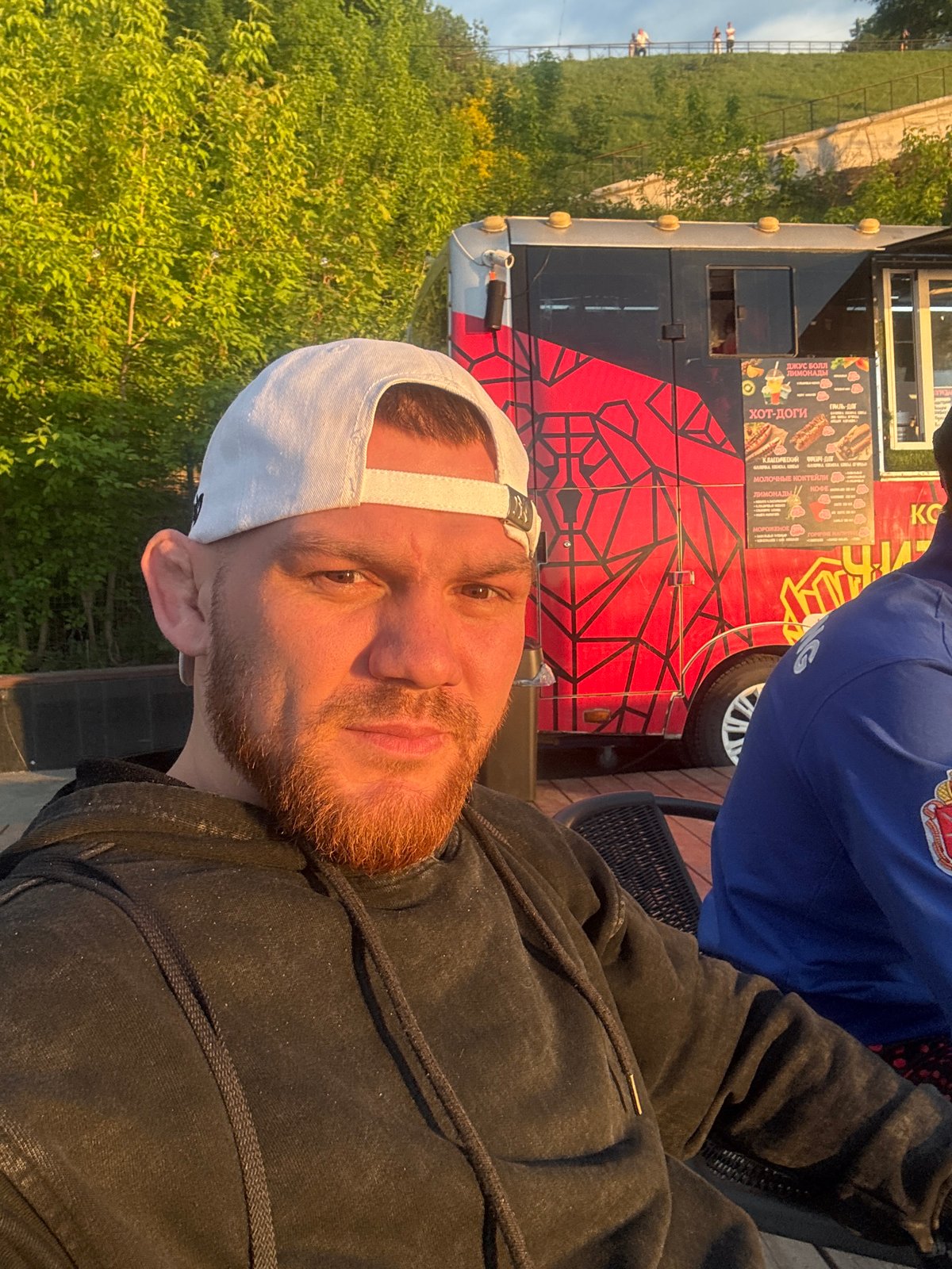 Man takes selfie near juice truck in Perm