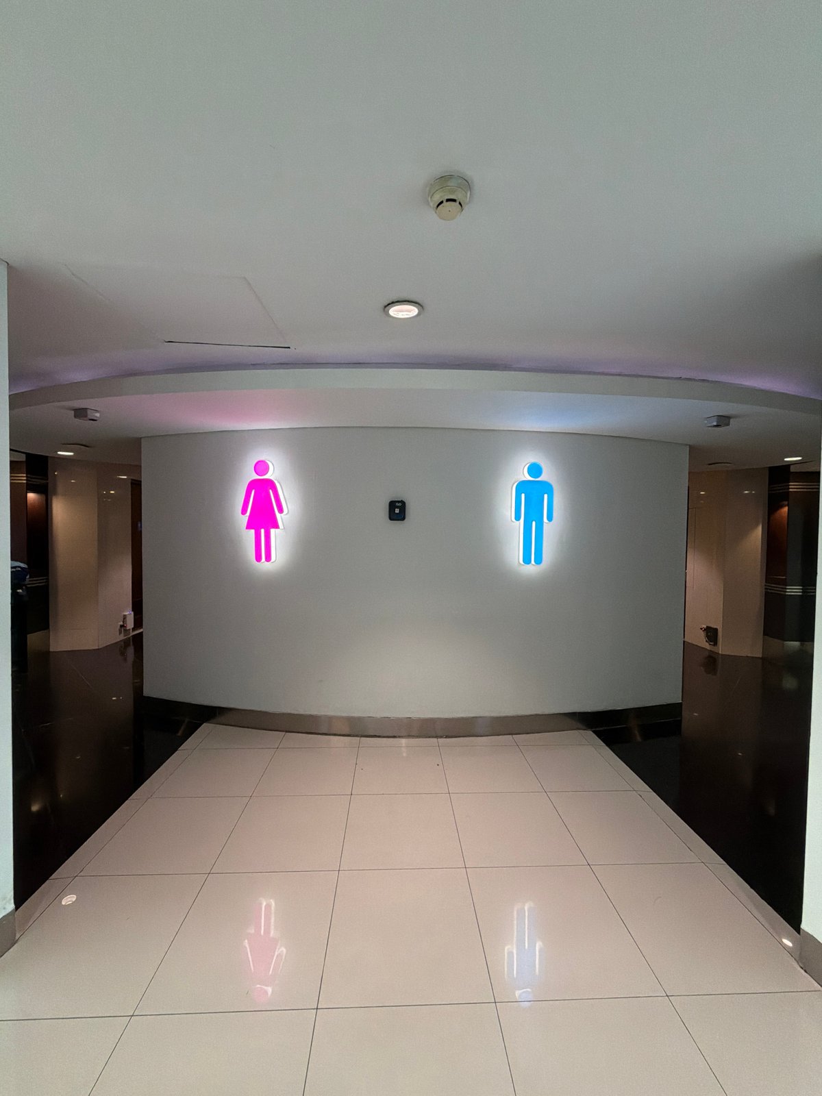 Modern restroom entrance documented in Tangerang public building