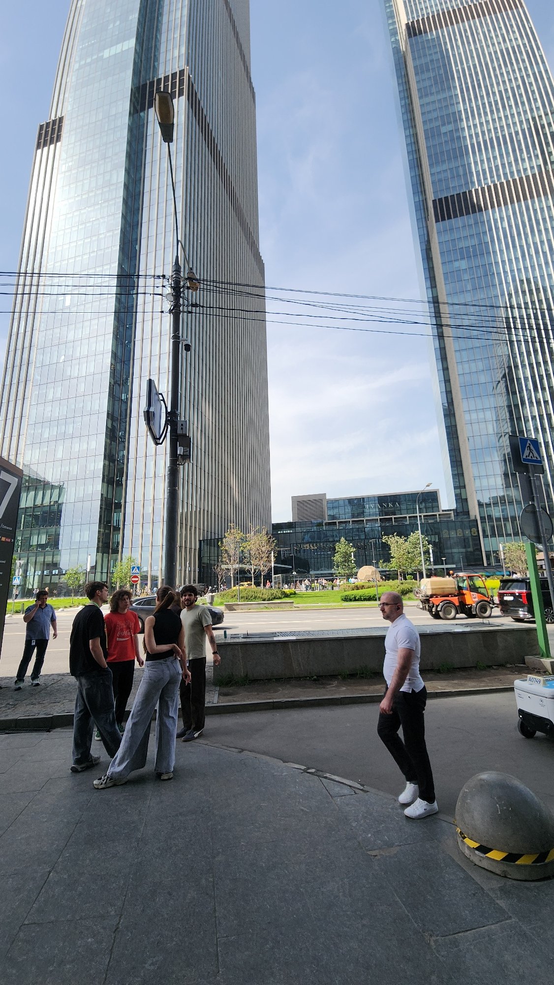Pedestrian walks against crowd flow on Moscow sidewalk