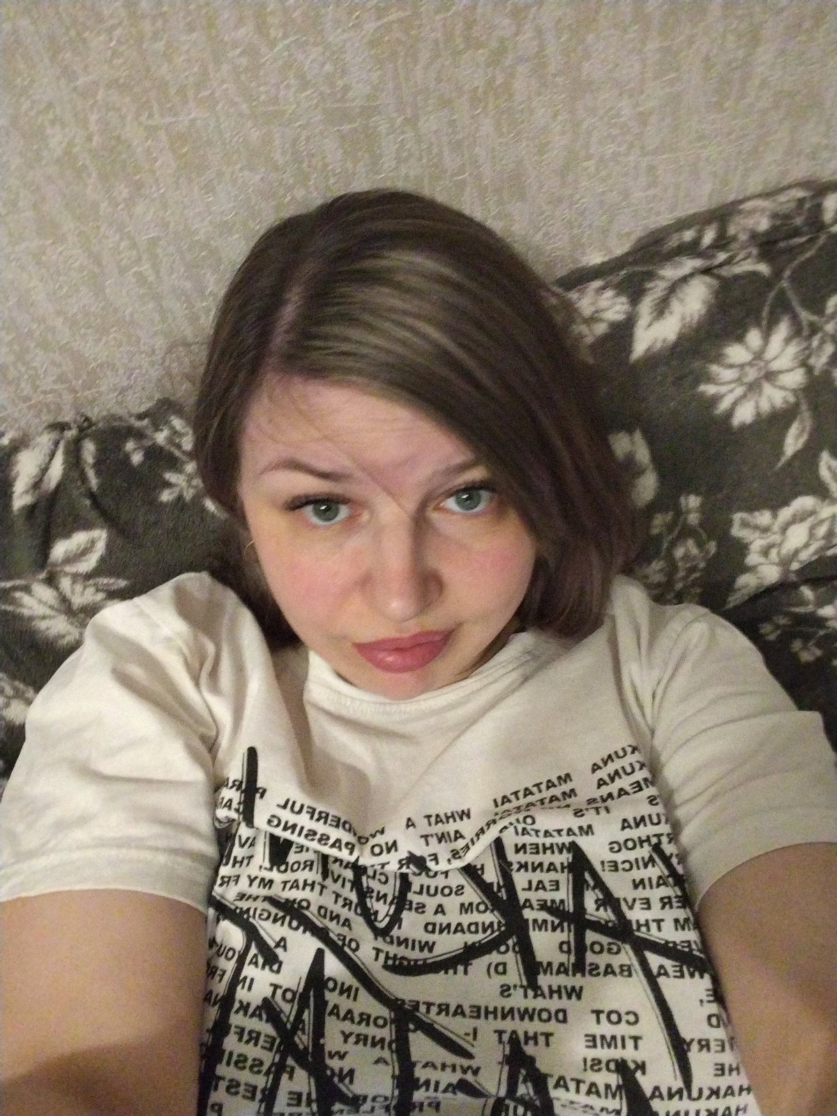 Woman takes selfies indoors in Rusanovo, Russia