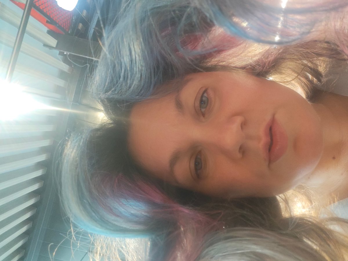 Woman with colorful hair photographed in Sholokhovo, Russia