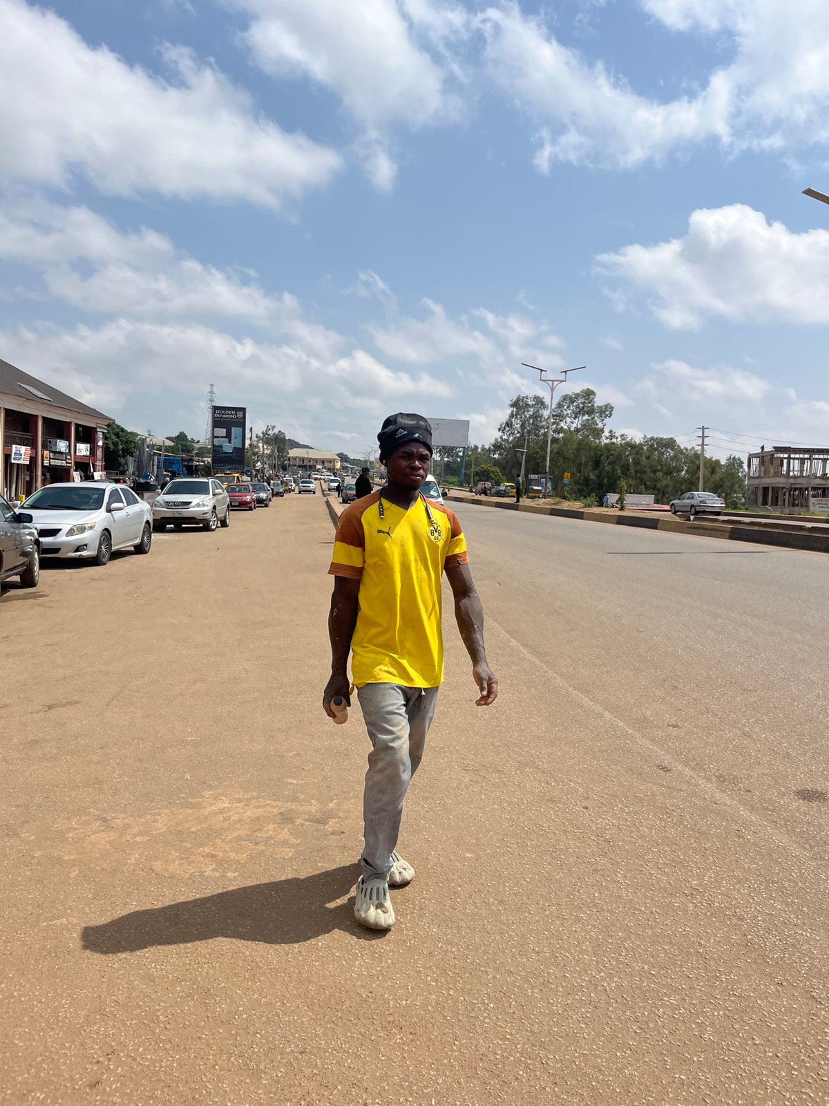 Morning street life and road activity in Gura Top, Nigeria