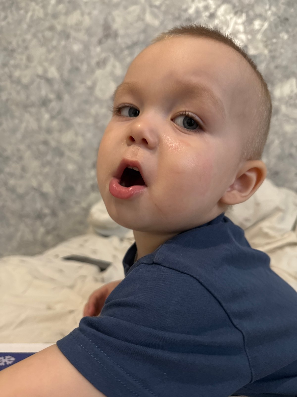 Toddler photographed in multiple indoor poses over 4-minute span