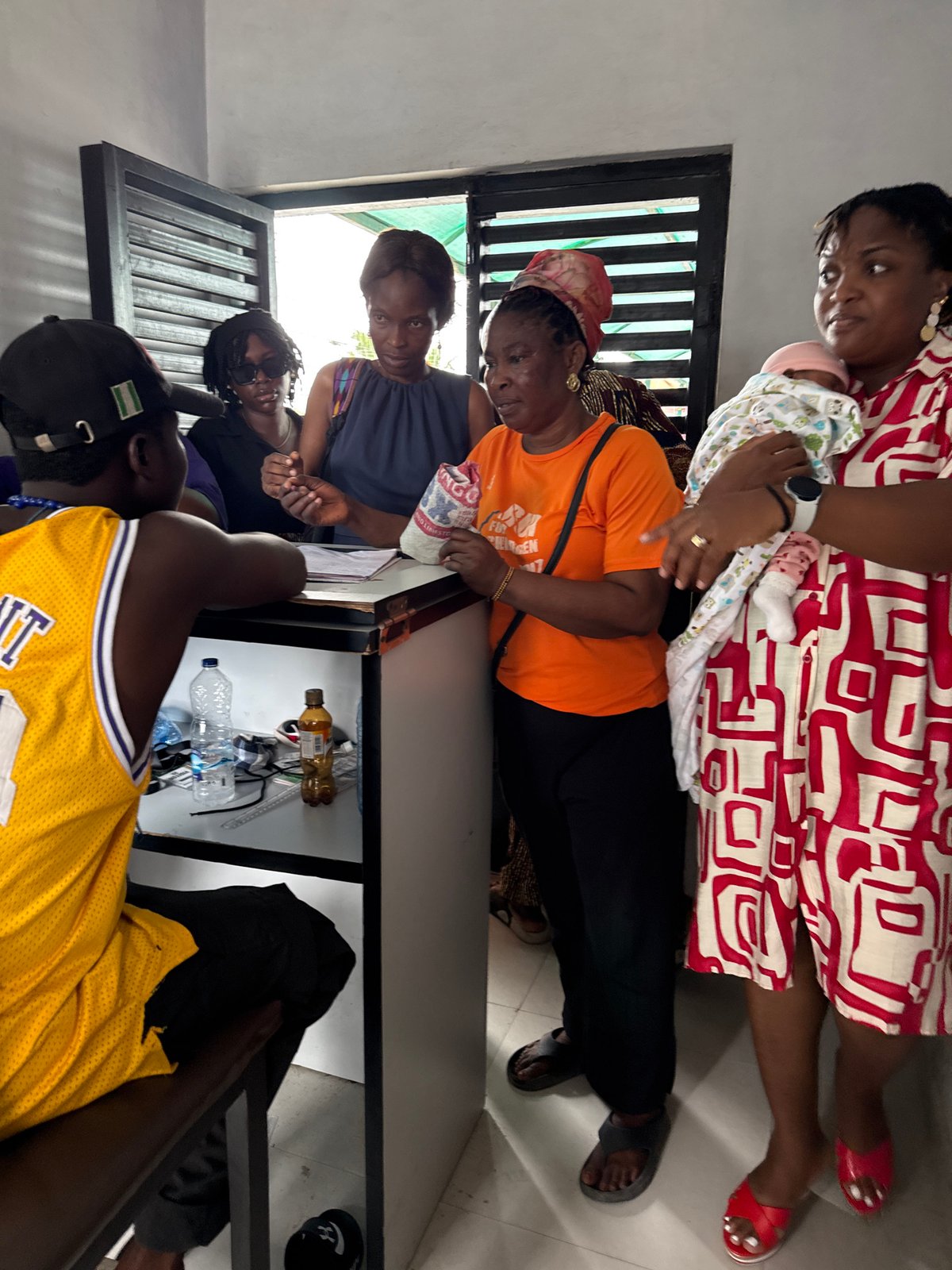 Citizens gather at Eti-Osa government office in Ojomu