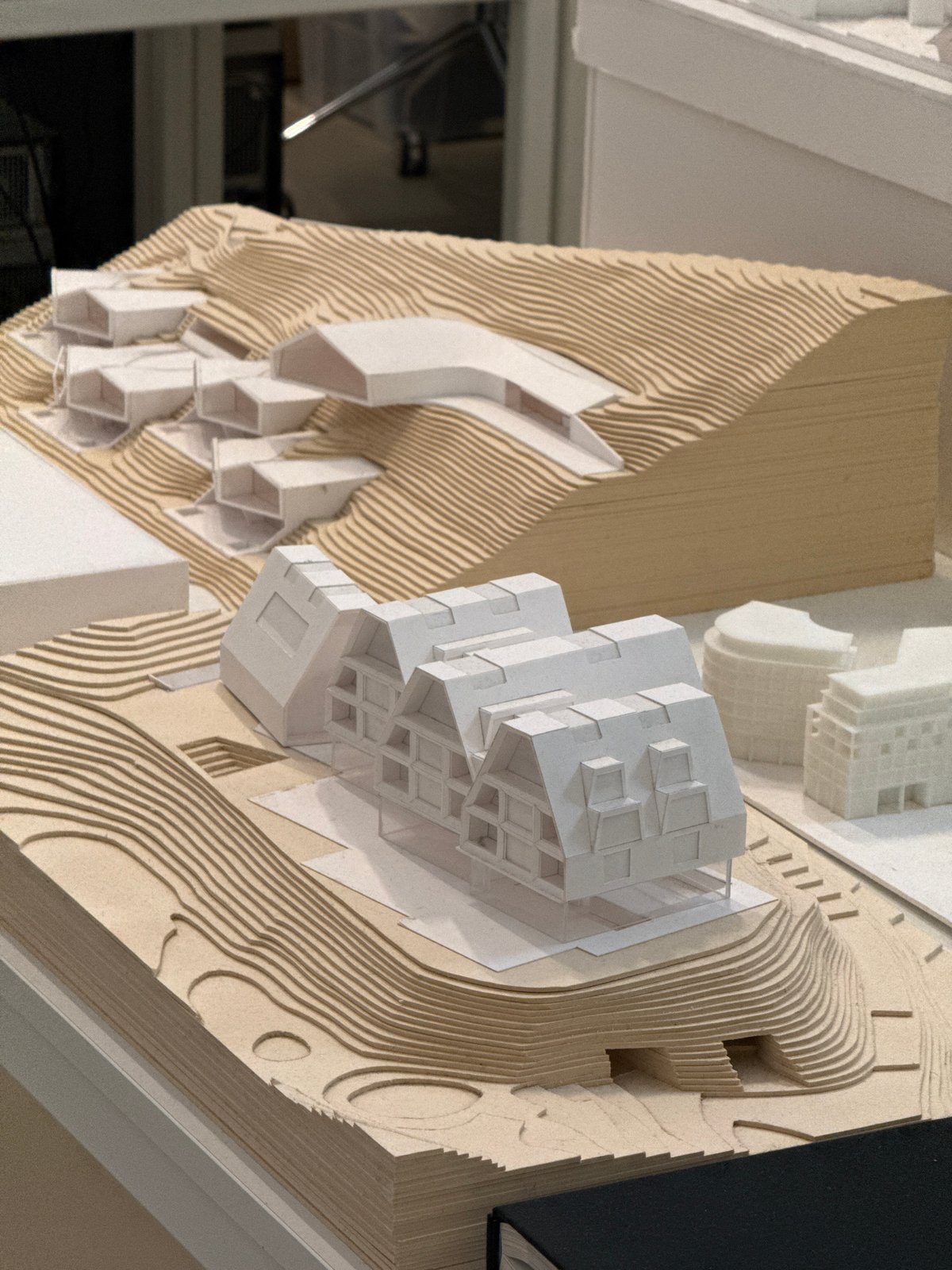 Architectural model with geometric building complex observed in Milan