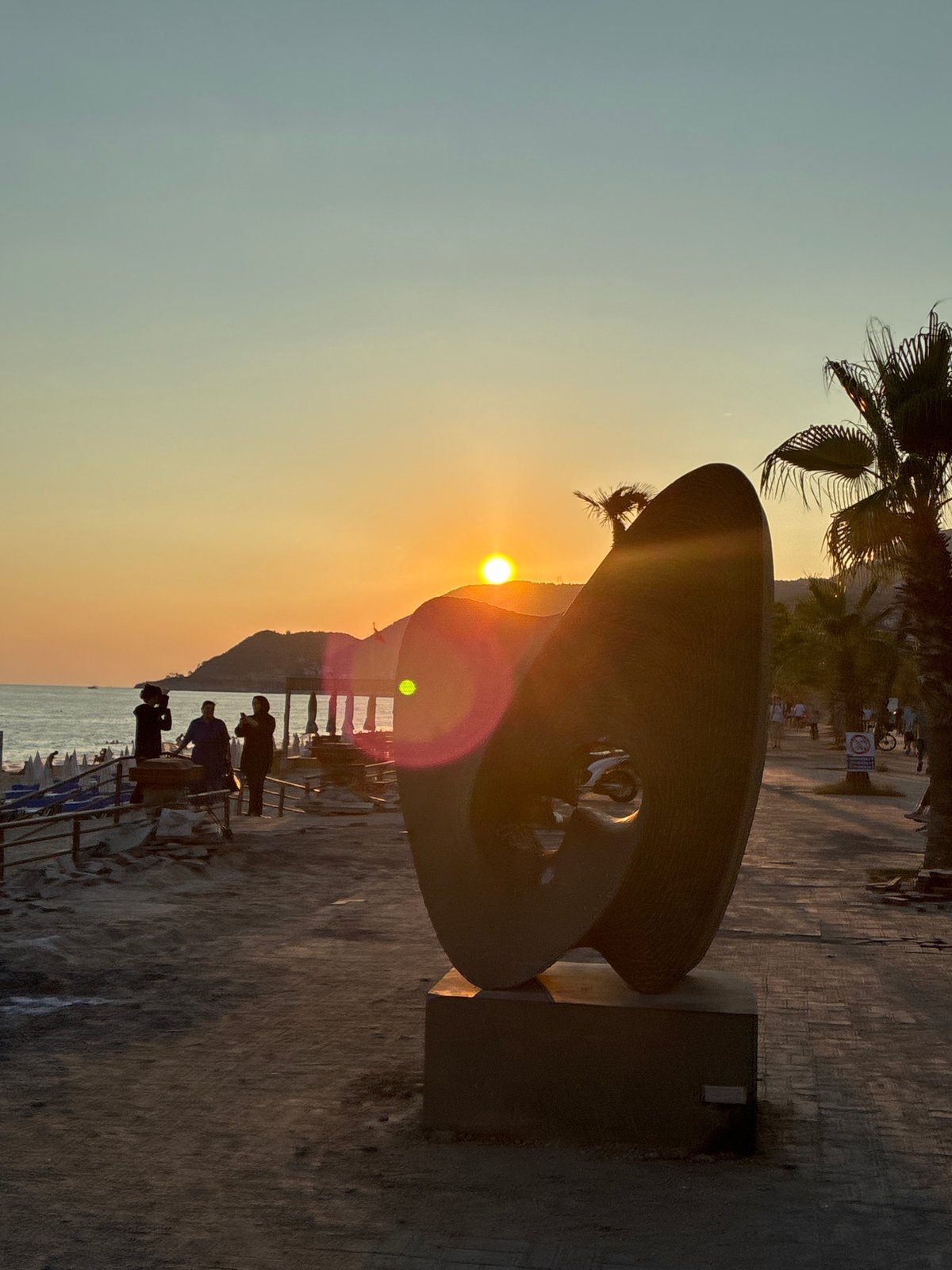 Sunset beach scenes and promenade life in Alanya, Turkey
