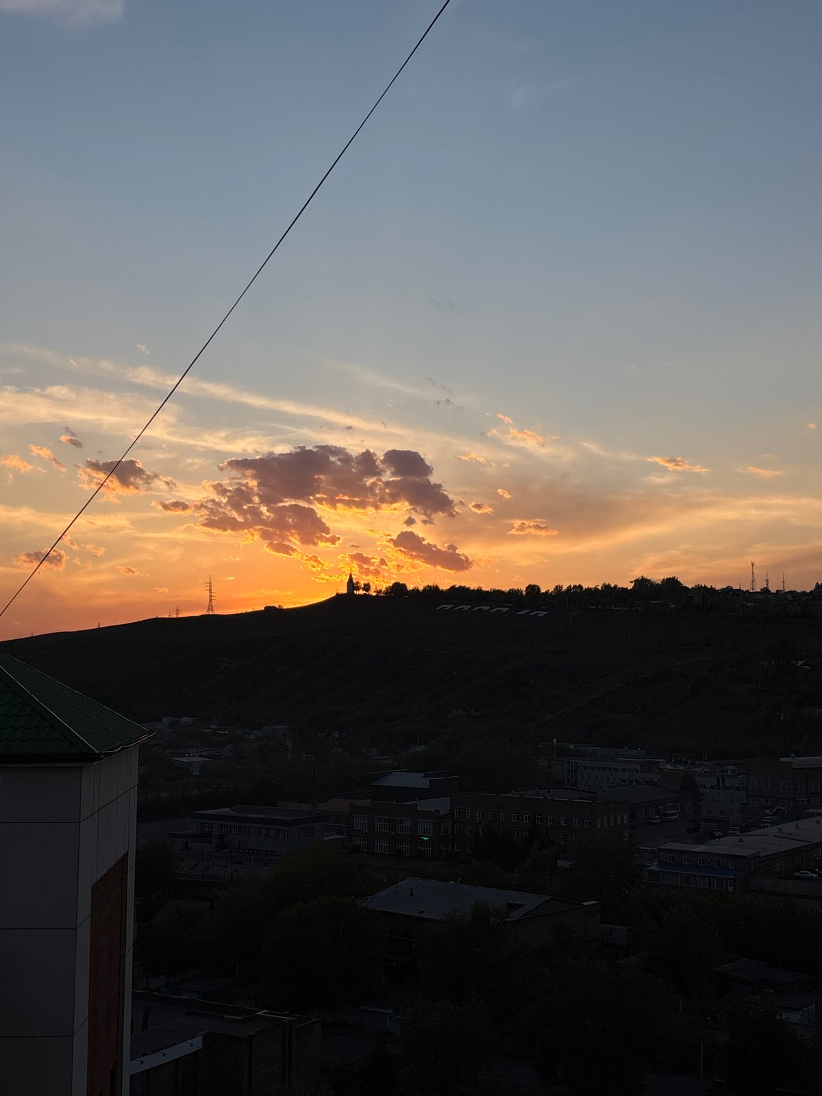 Vibrant sunset lights up Krasnoyarsk sky over Yenisey River