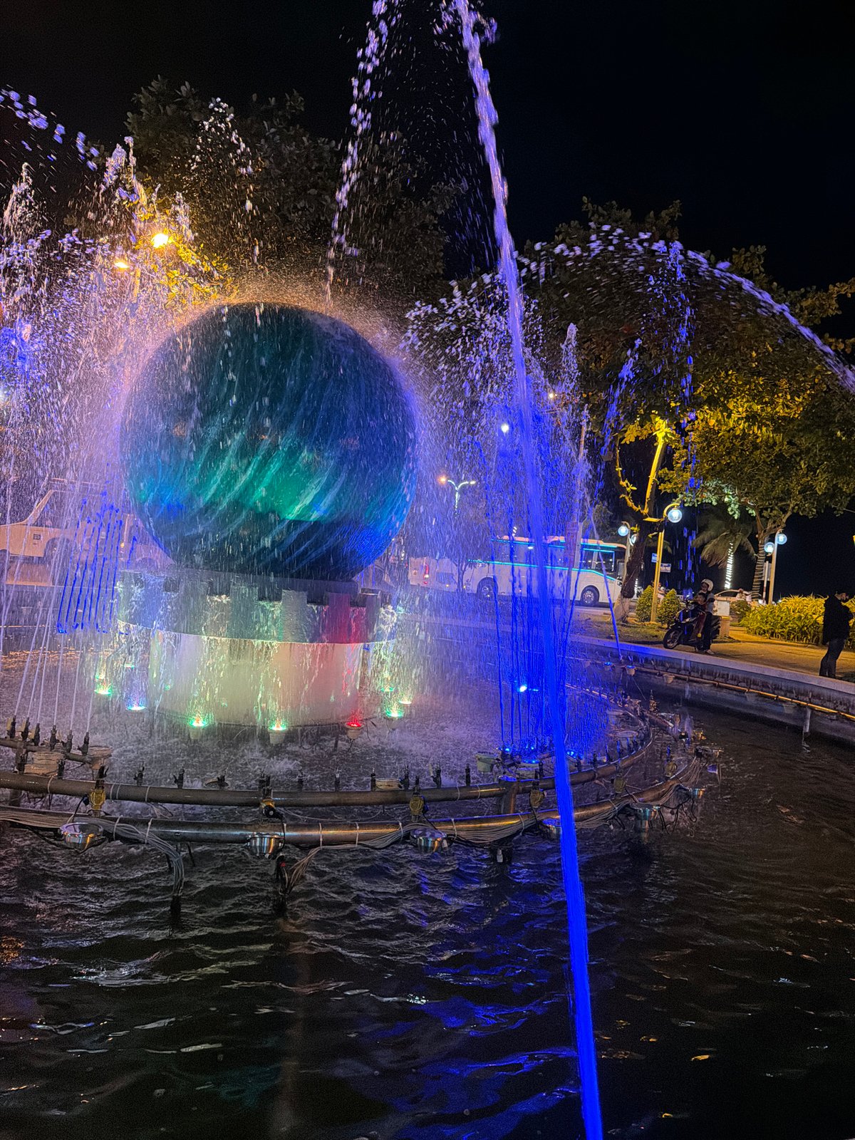 Nha Trang at night: fountains, lantern-lit streets, and city life