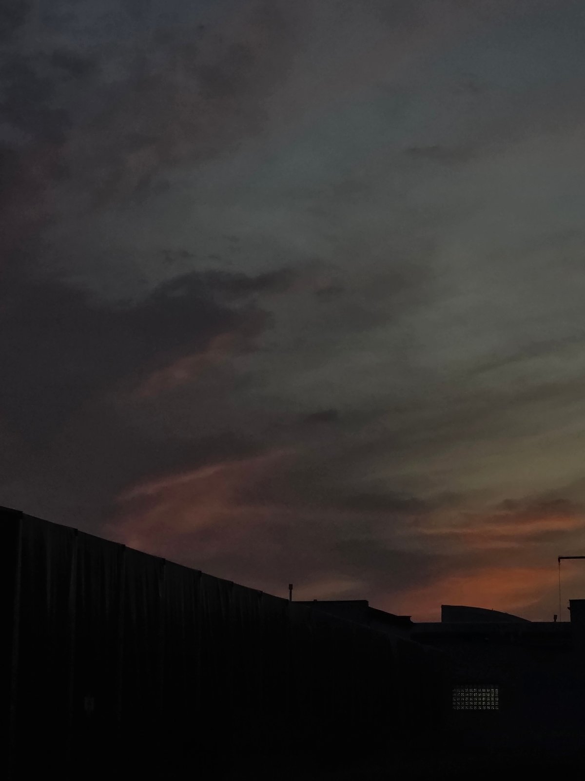 Dusk settles over an unidentified city street