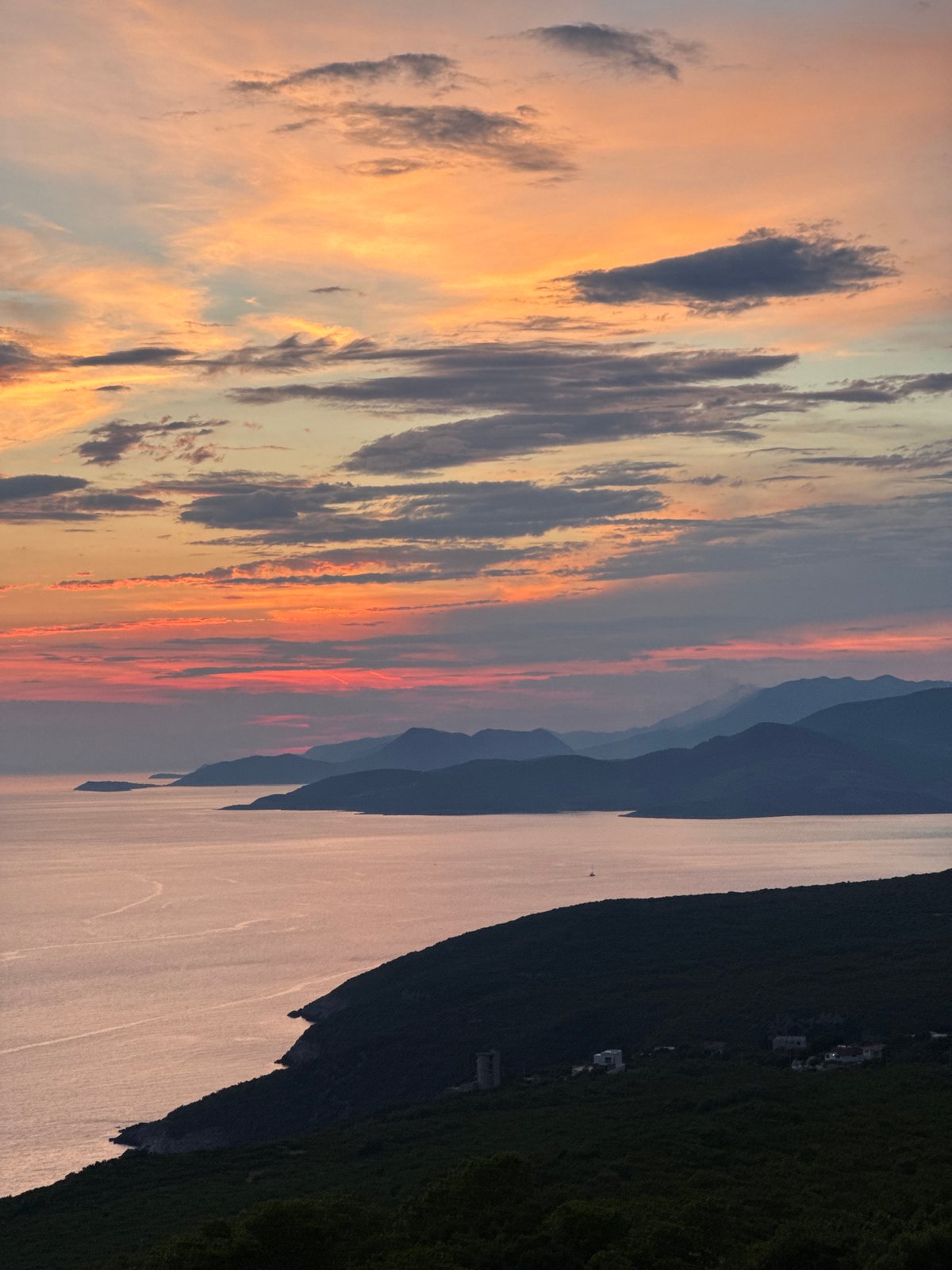 Adriatic sunset over Montenegro's coastline, many angles