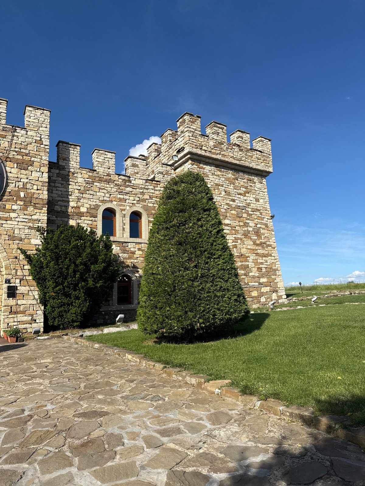 Tourist documents medieval warrior statue at Bulgarian museum
