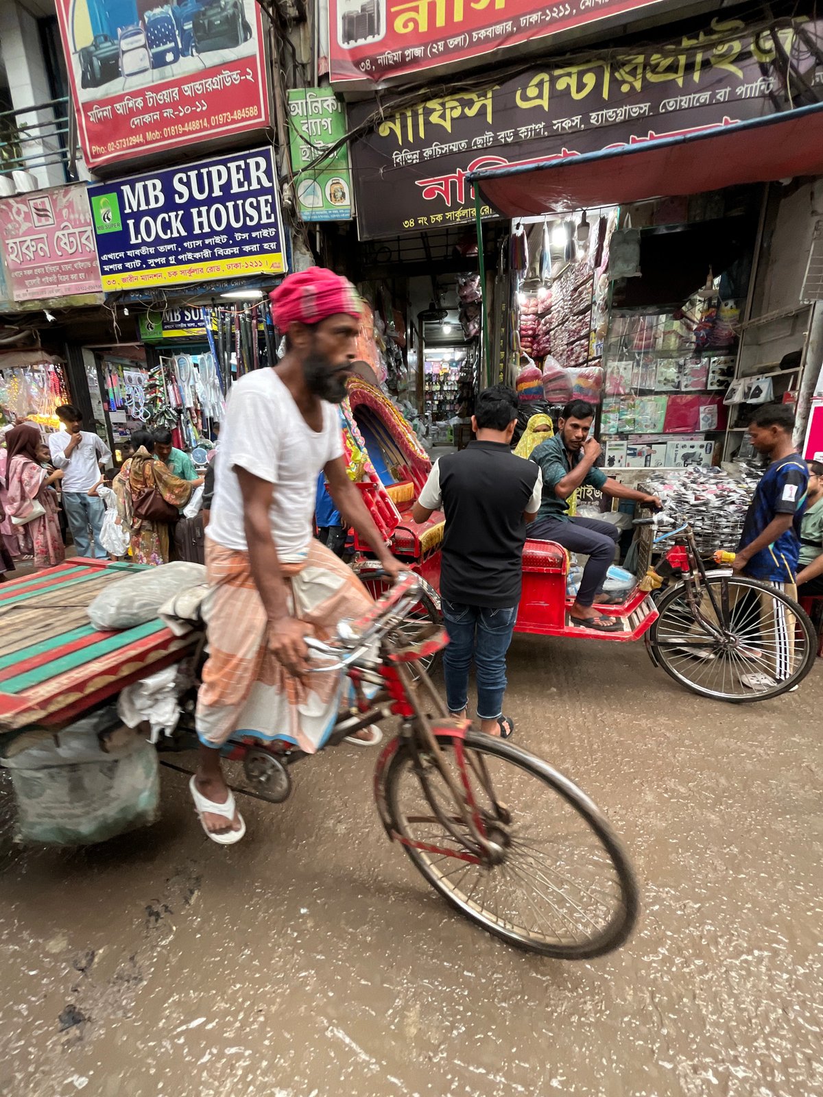 Morning street commerce unfolds across Dhaka's busy markets