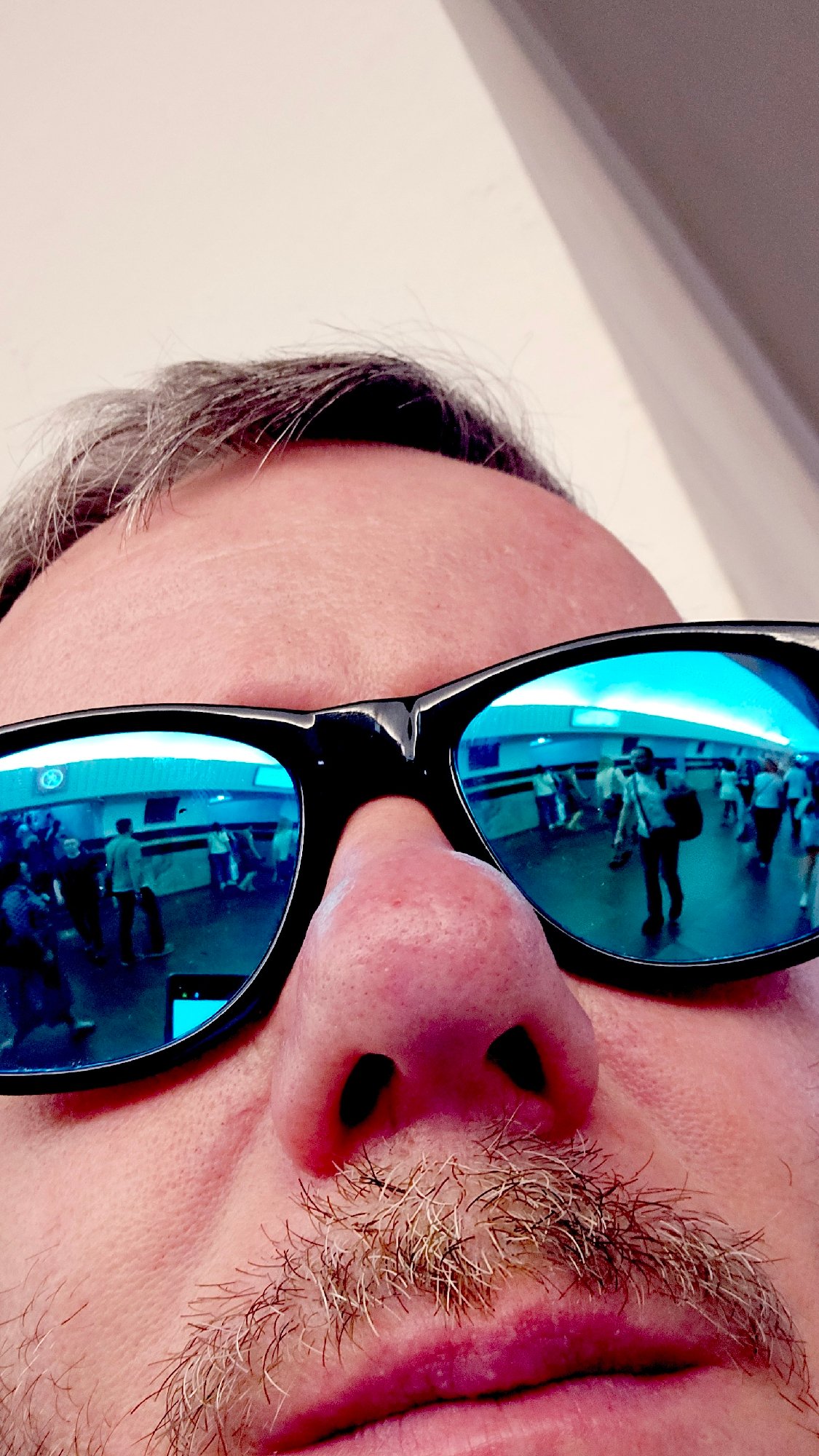 Moscow resident in mirrored sunglasses captured in multiple locations