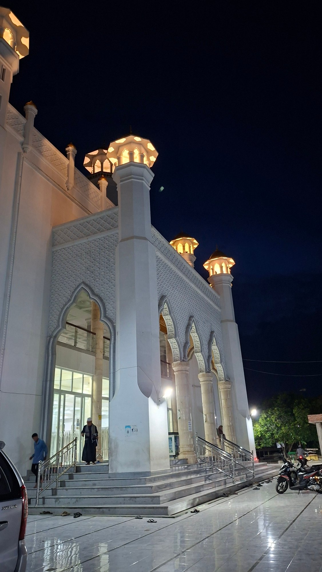 Langsa's Grand Mosque at dusk, inside and out