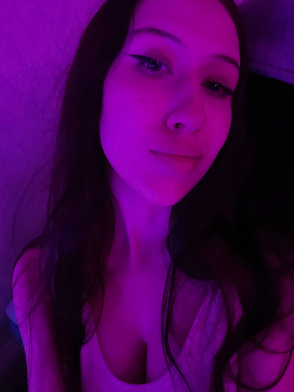 29 purple-lit selfies from one Votkinsk room, one evening