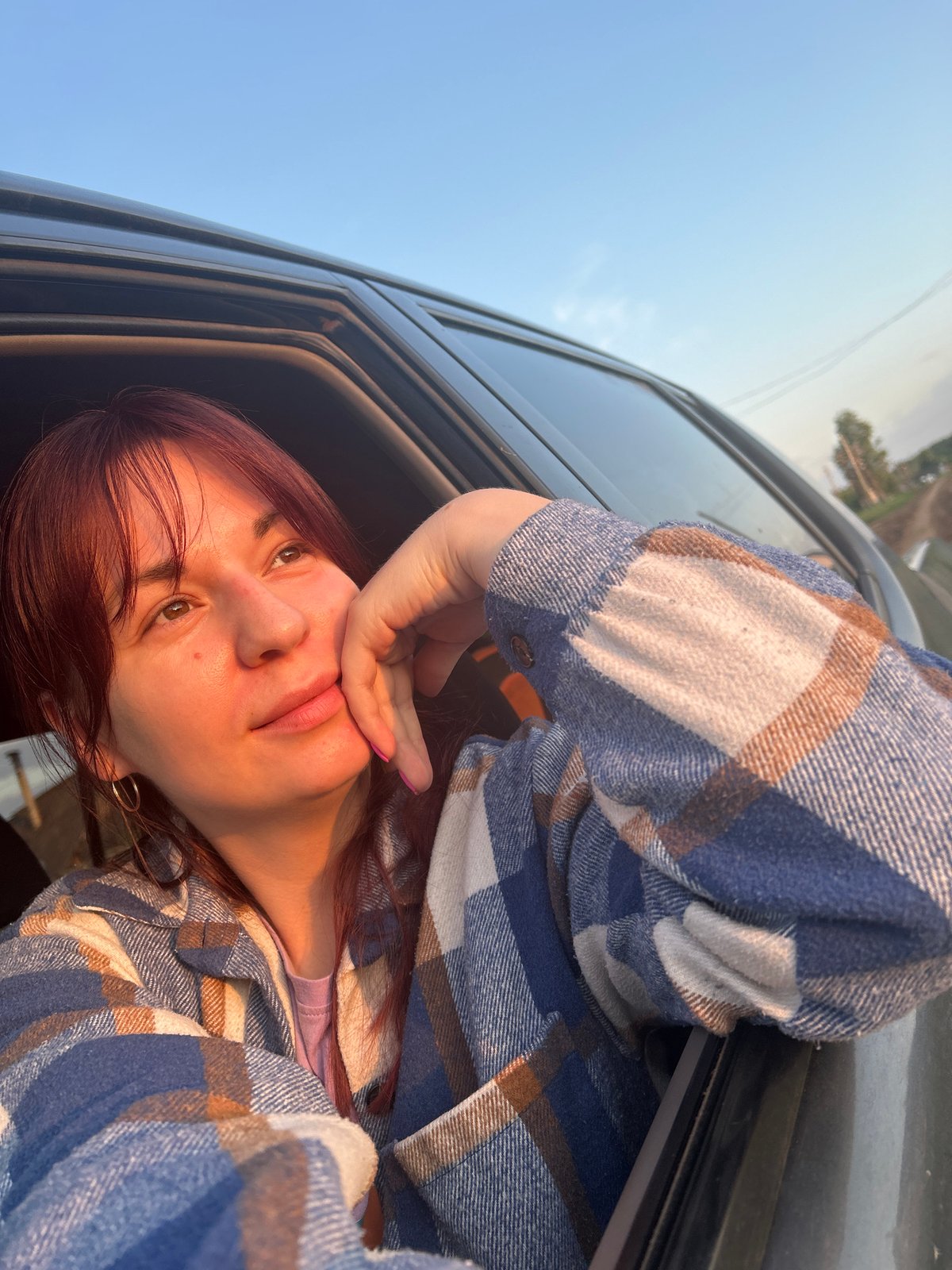 Roadside selfies at sunrise in Foky, Russia