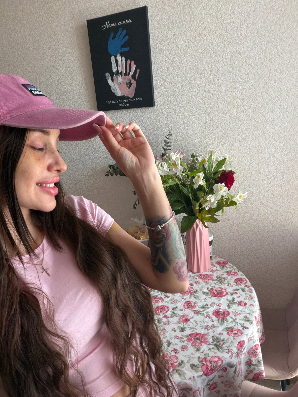 Woman takes mirror selfies in pink outfit, Saint Petersburg