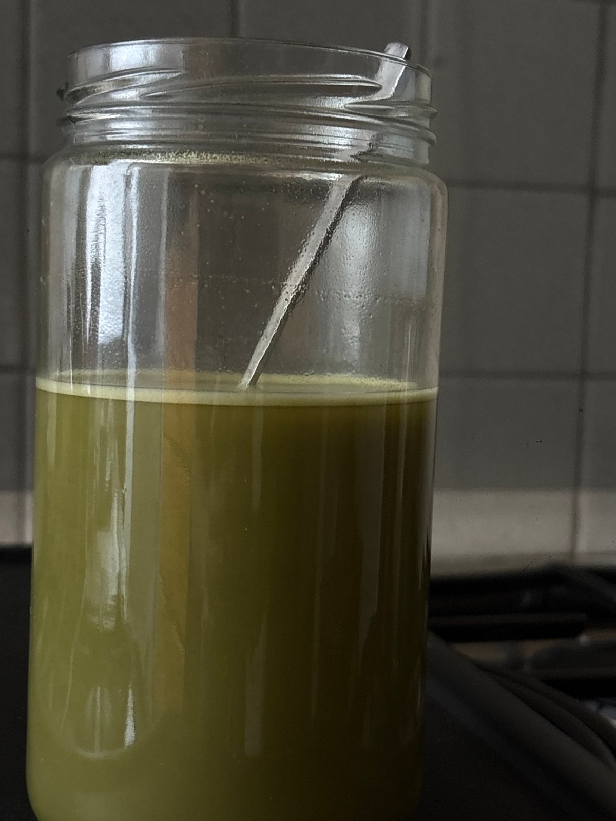 Glass jar with green liquid observed in Mexico City