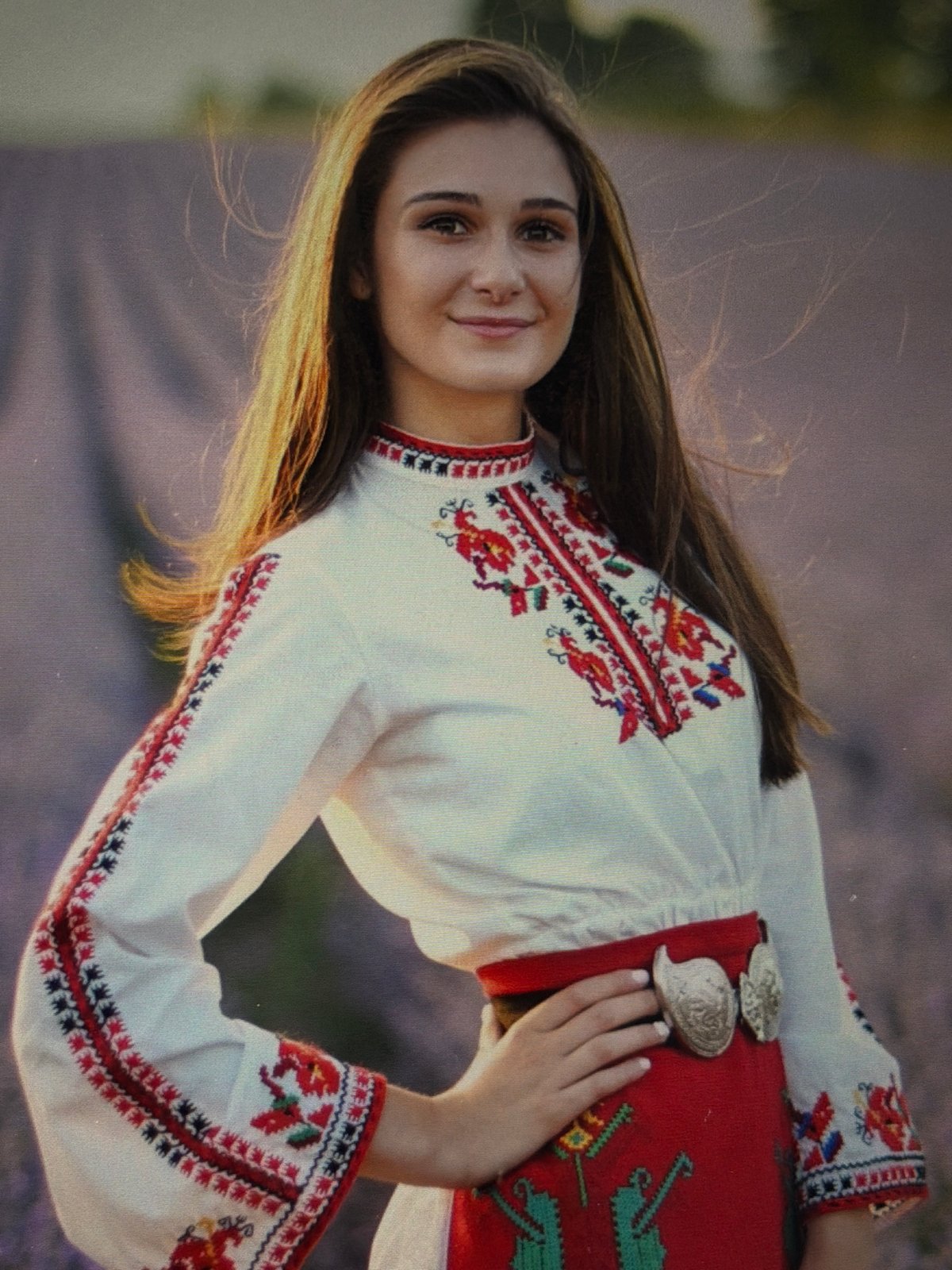 Traditional Bulgarian costume gathering documented in rose fields