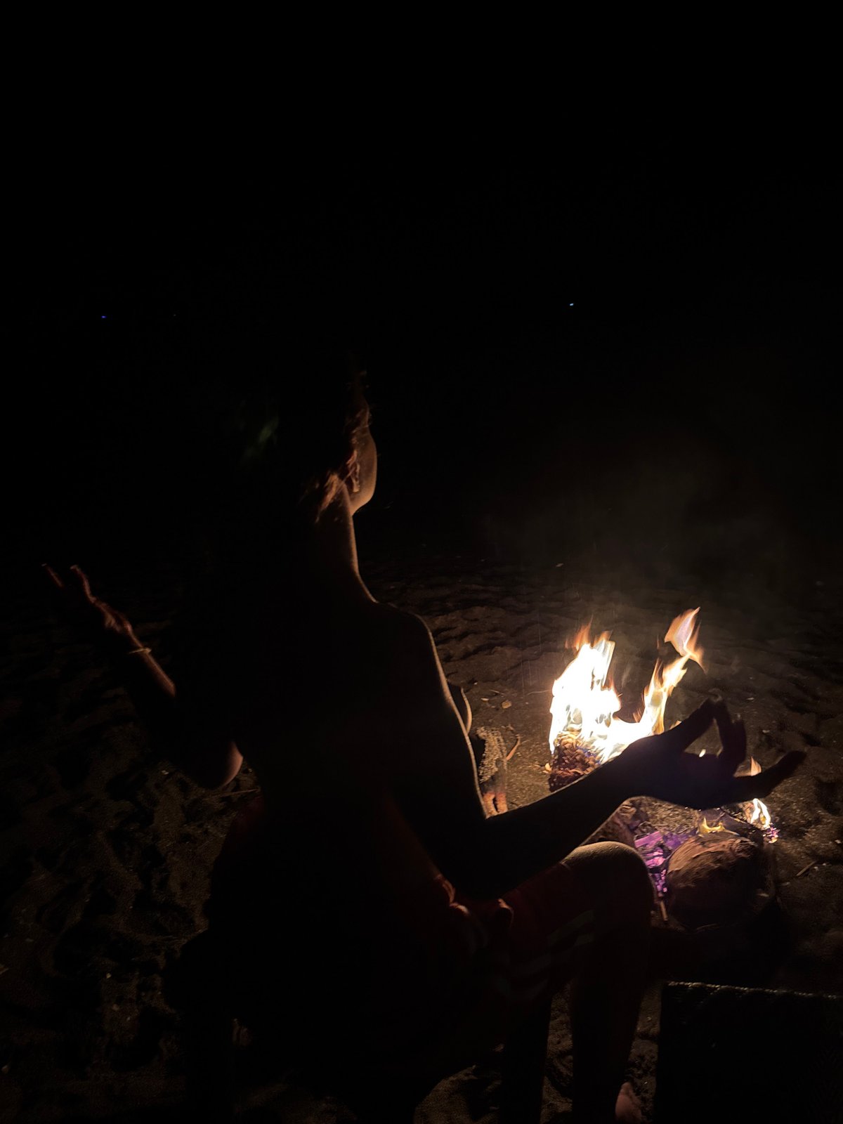 Beach volleyball and casual activities observed at Indonesian coastal location