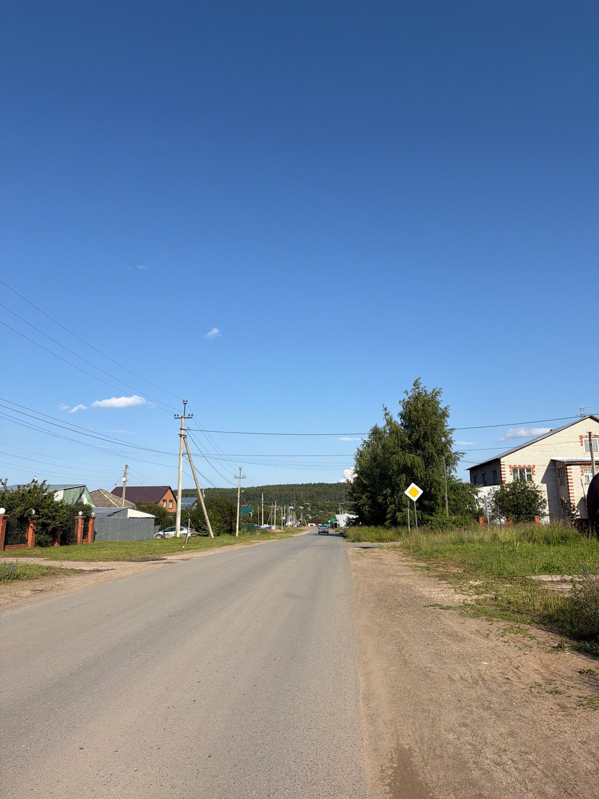 Quiet streets and residential corners of Chaikovsky on a sunny afternoon