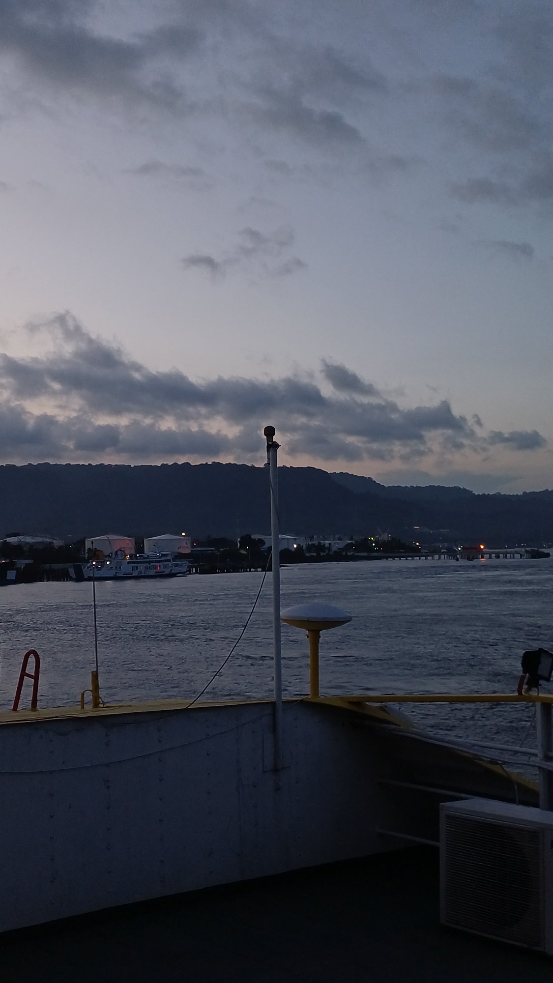 Coastal city captured from ship, air, and bedroom window