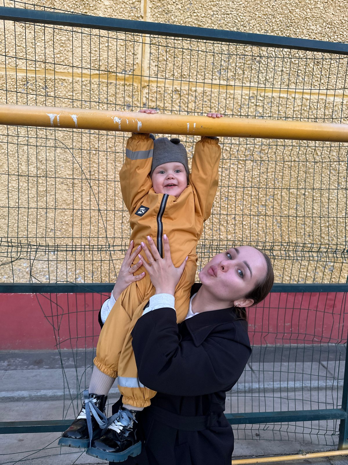 Family playground afternoon captured in Chaikovsky, Russia