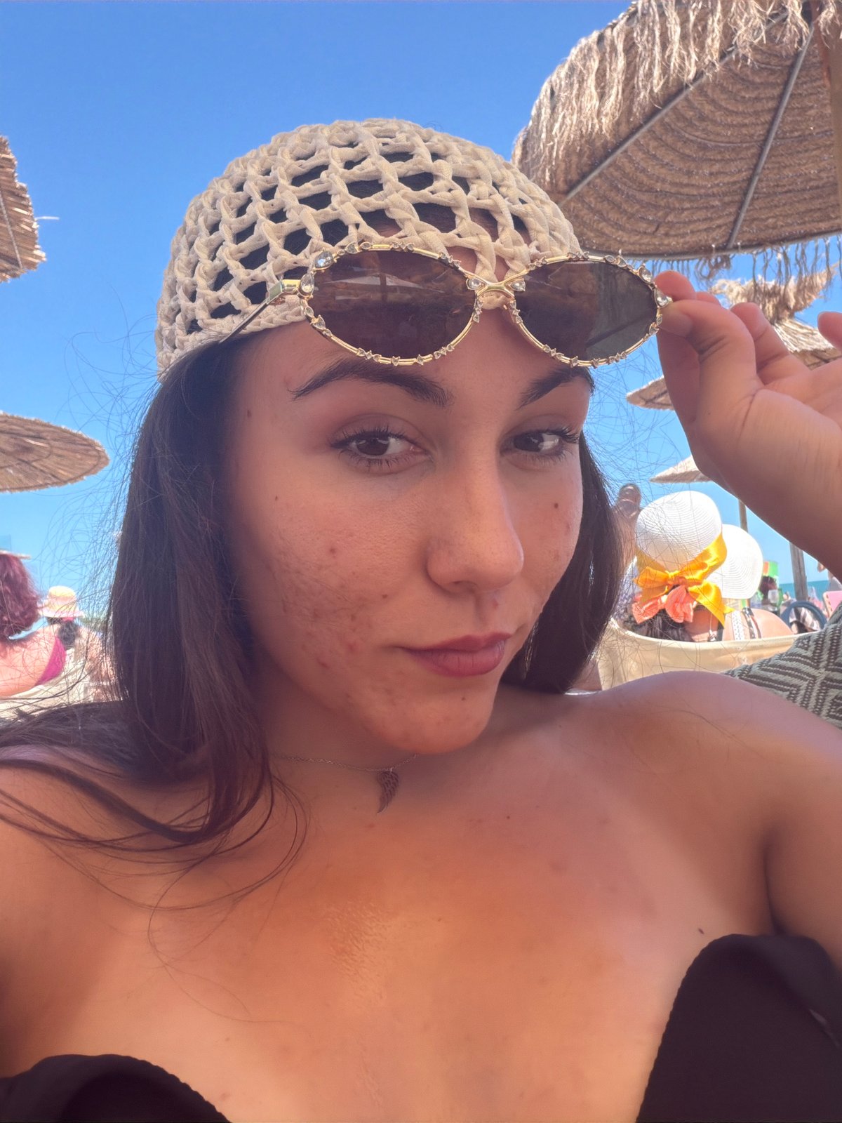 Sunny beach afternoon in Varna with selfies and straw umbrellas
