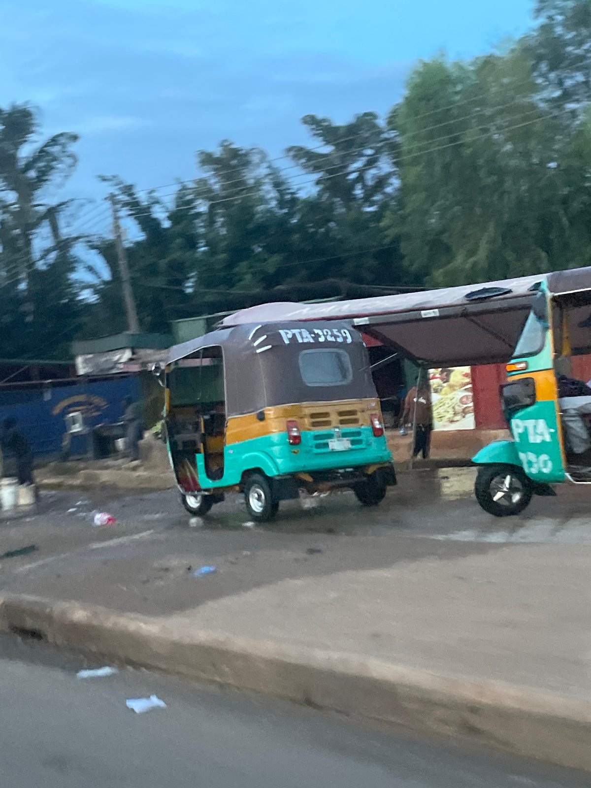 Dusk ride through Jos streets, keke and city life