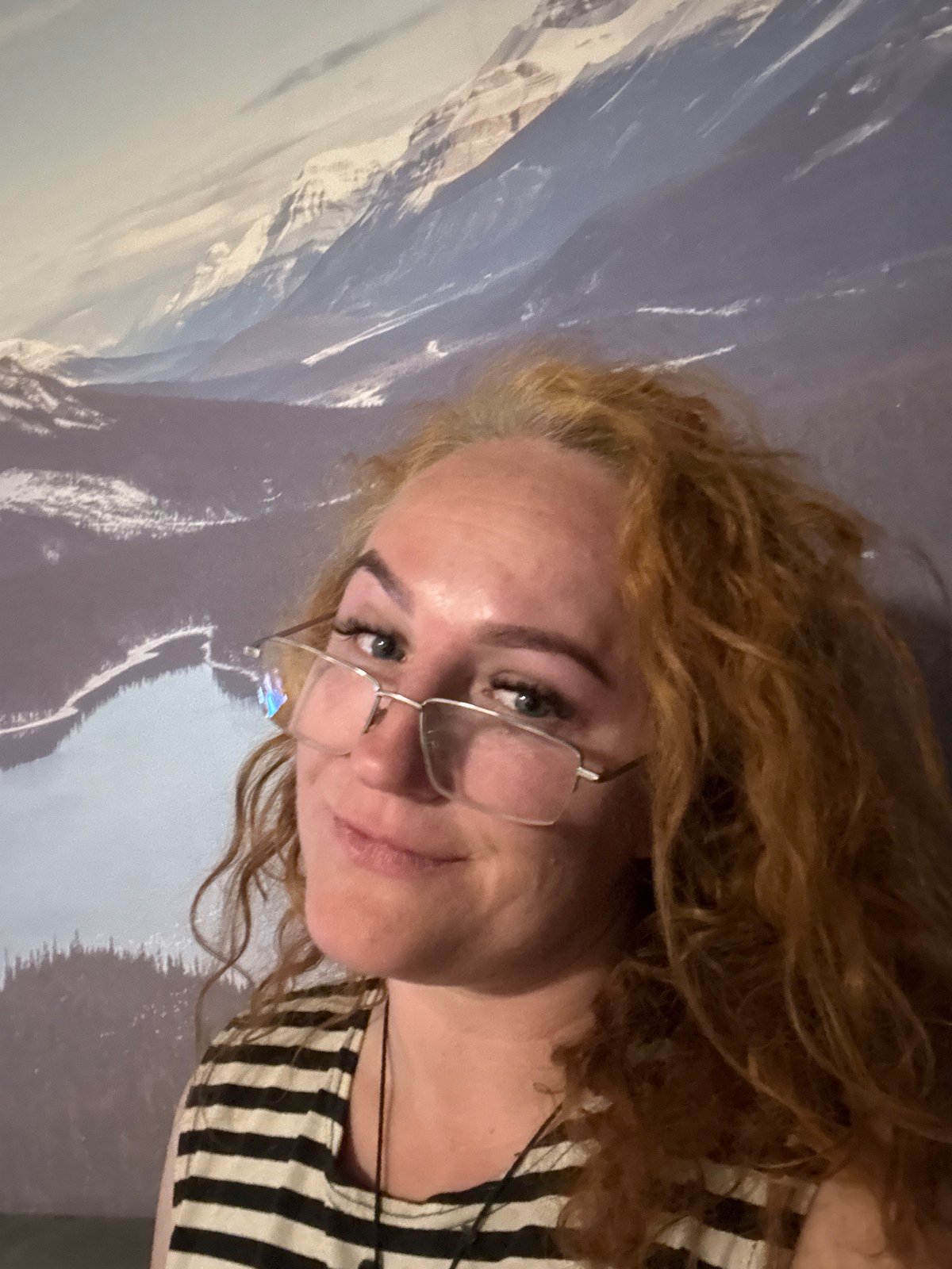Woman photographed in multiple indoor portraits in Chaikovsky, Russia