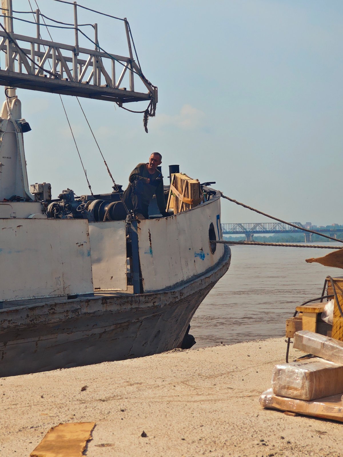 Heavy crane and barge operations at Krasnoyarsk river port