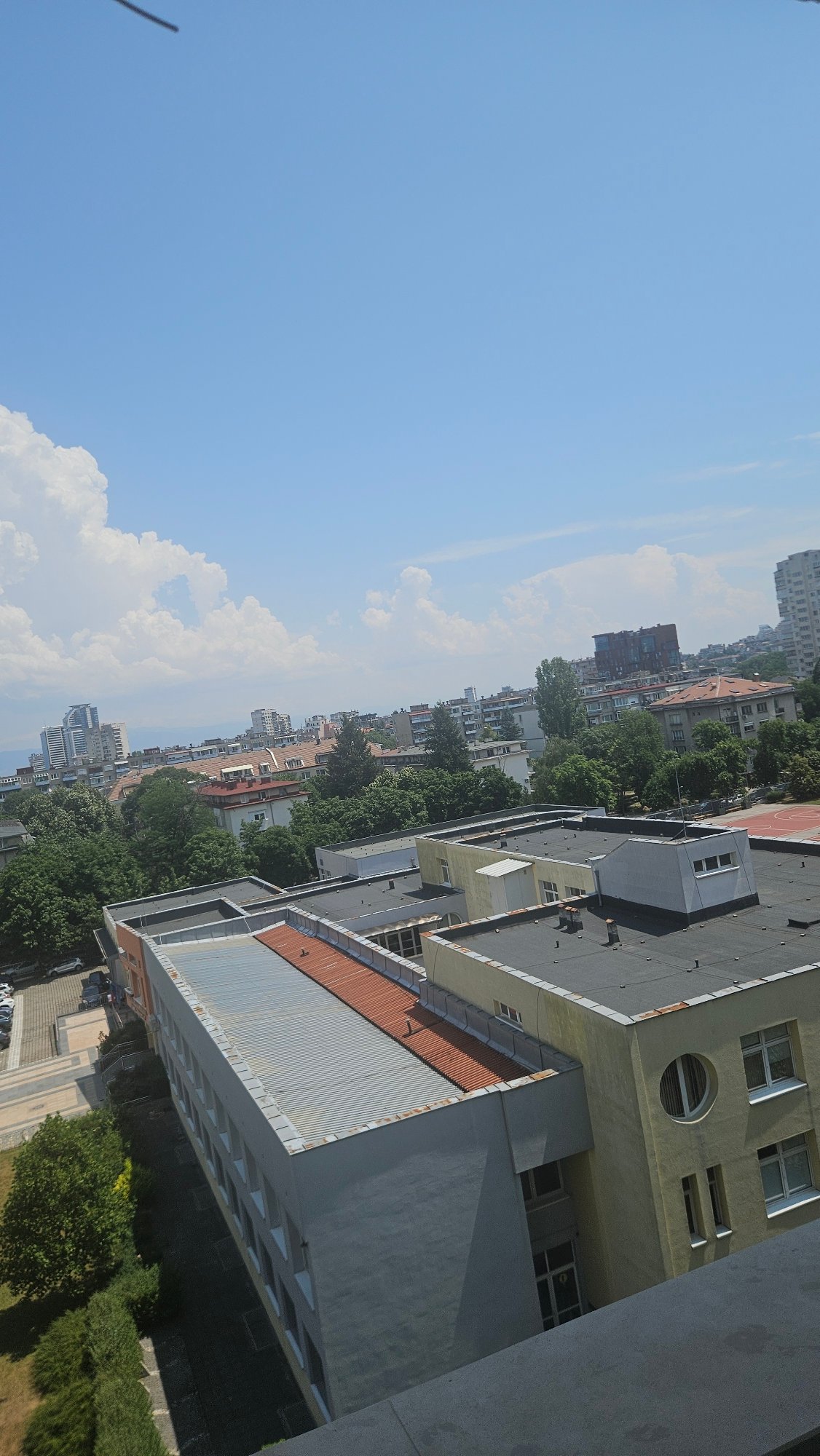 Rooftop-level views across a sunny Sofia neighborhood