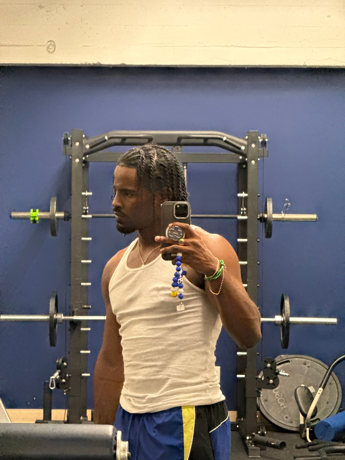 Young athlete takes mirror selfie at Los Angeles gym