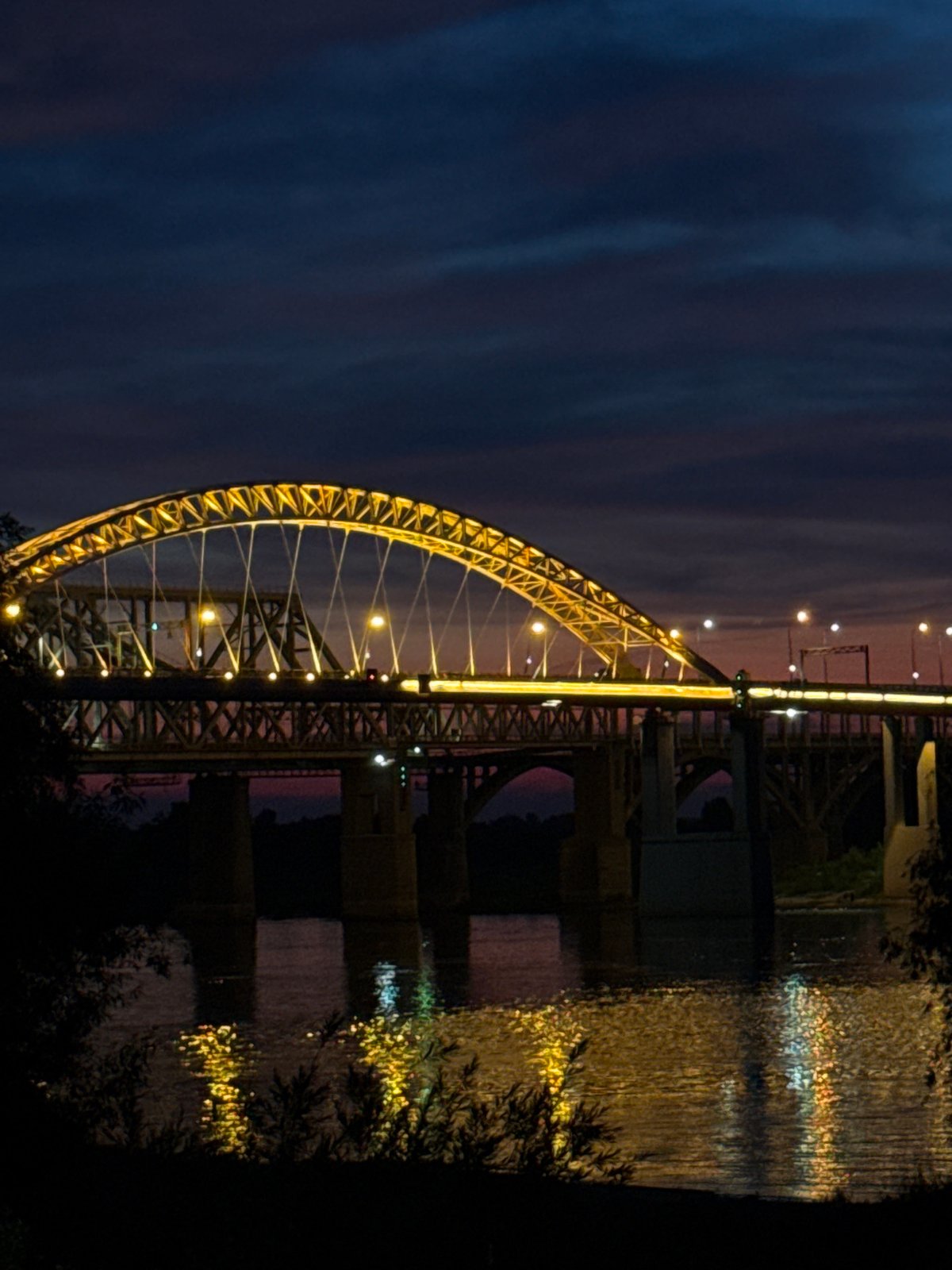 Illuminated Borodinsky Bridge creates evening spectacle over Volga River