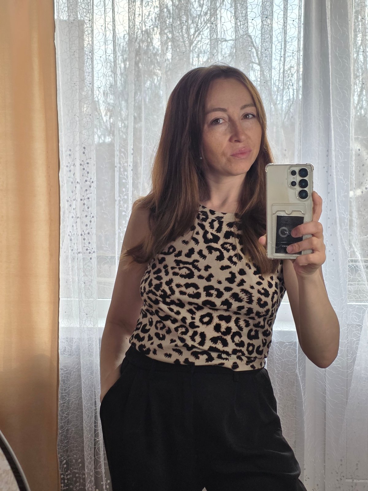 Woman documents early morning moments through selfies in Chaikovsky