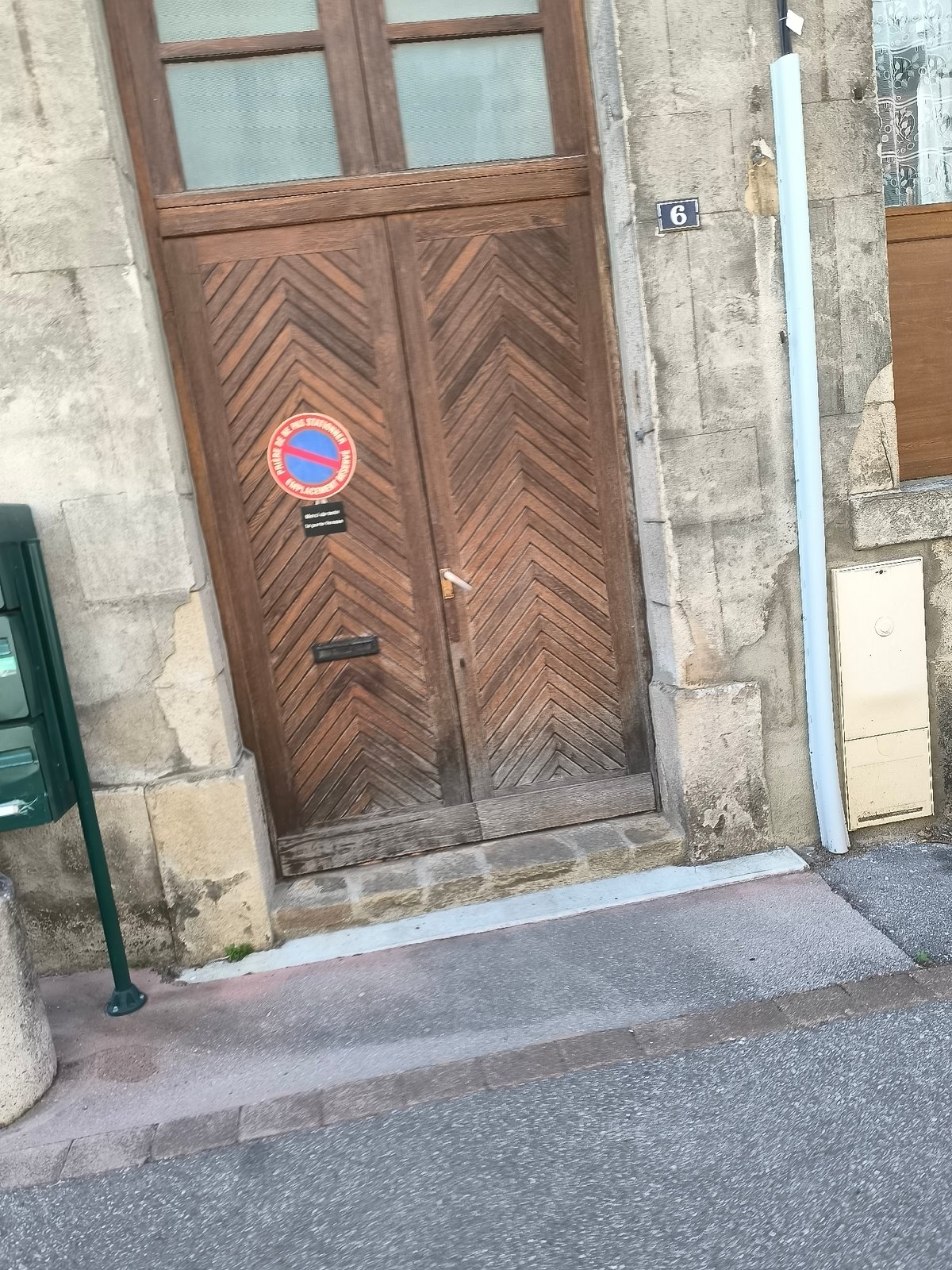 Pedestrian documents casual walk through Pélussin neighborhood streets