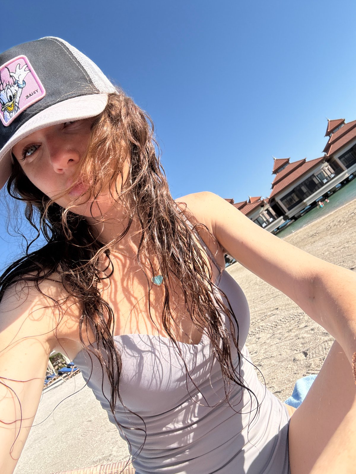 Beach day documented at Dubai resort through selfies and activities
