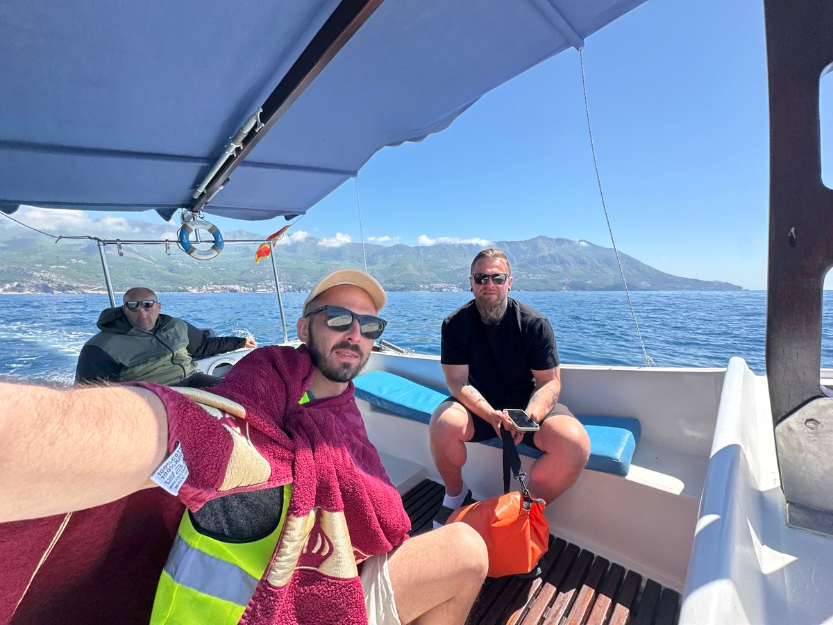 Boat excursion captures scenic Adriatic coastline near Budva, Montenegro