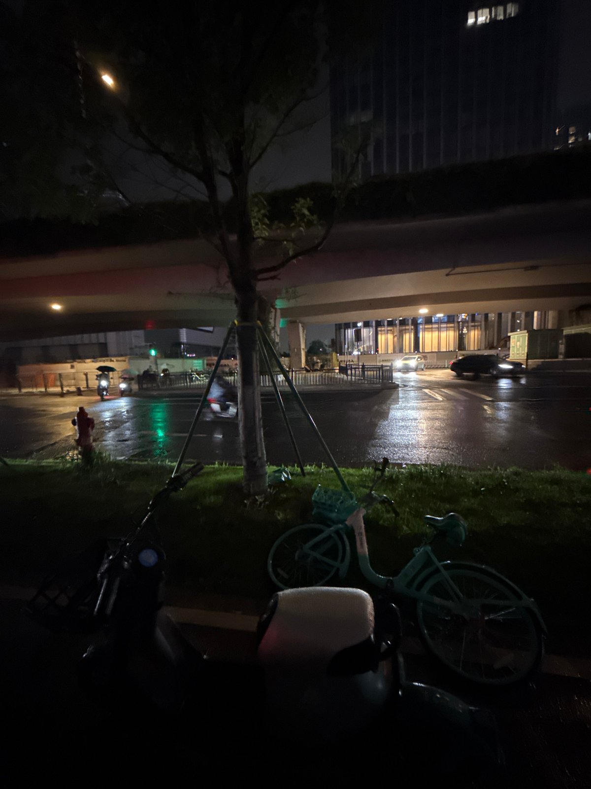 Rainy night street life documented across Guangzhou districts
