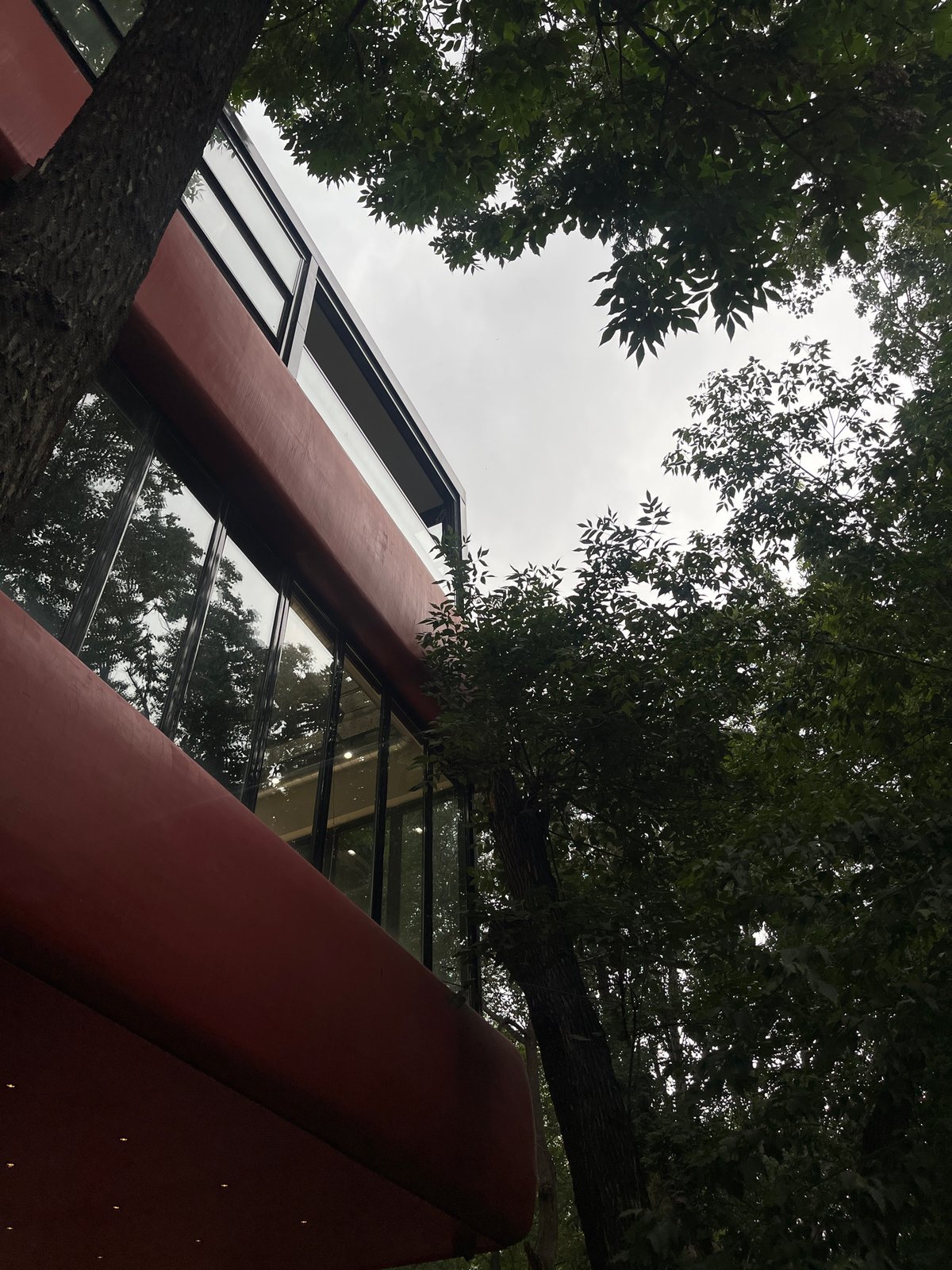 Afternoon at a red modernist café in Yerevan's greenery