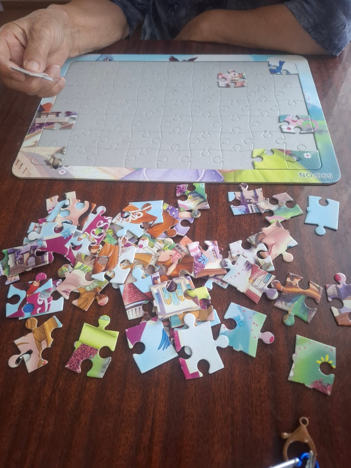 Puzzle building and goofy selfies at home in Almaty