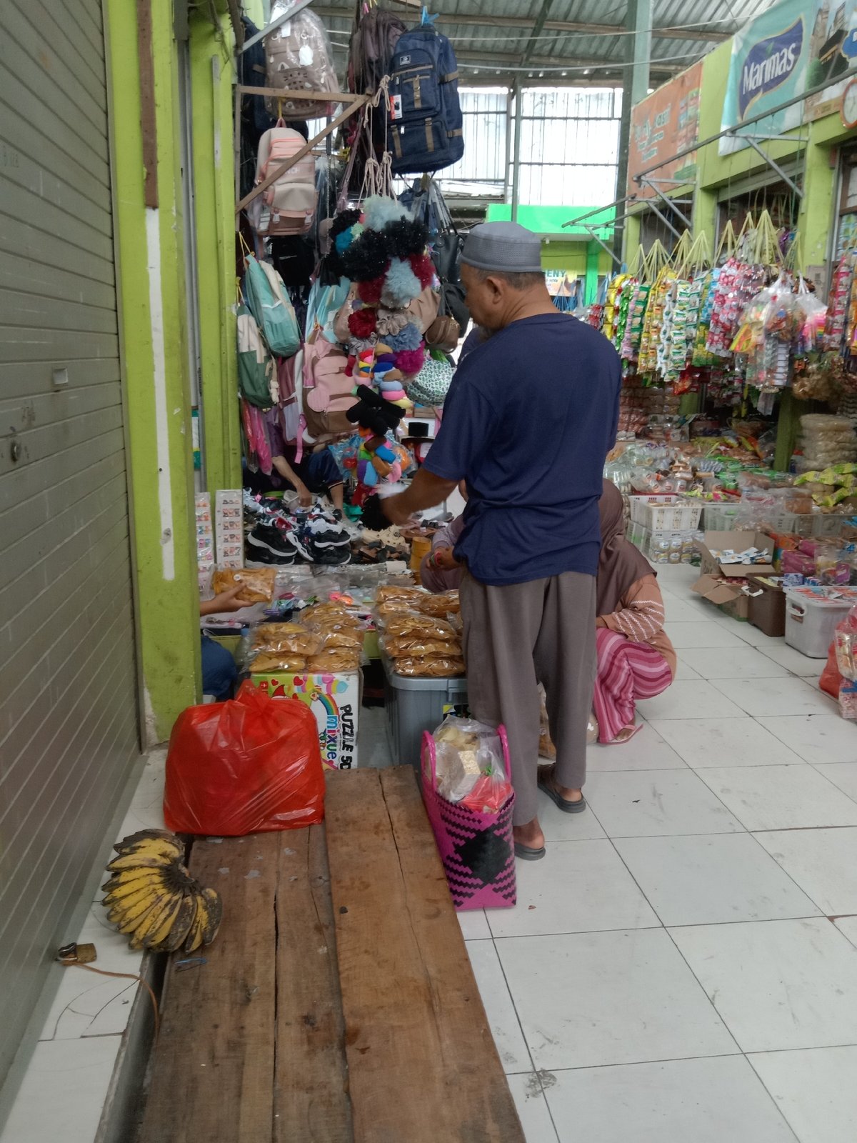 Everyday scenes inside a local market in Sugihwaras, Indonesia
